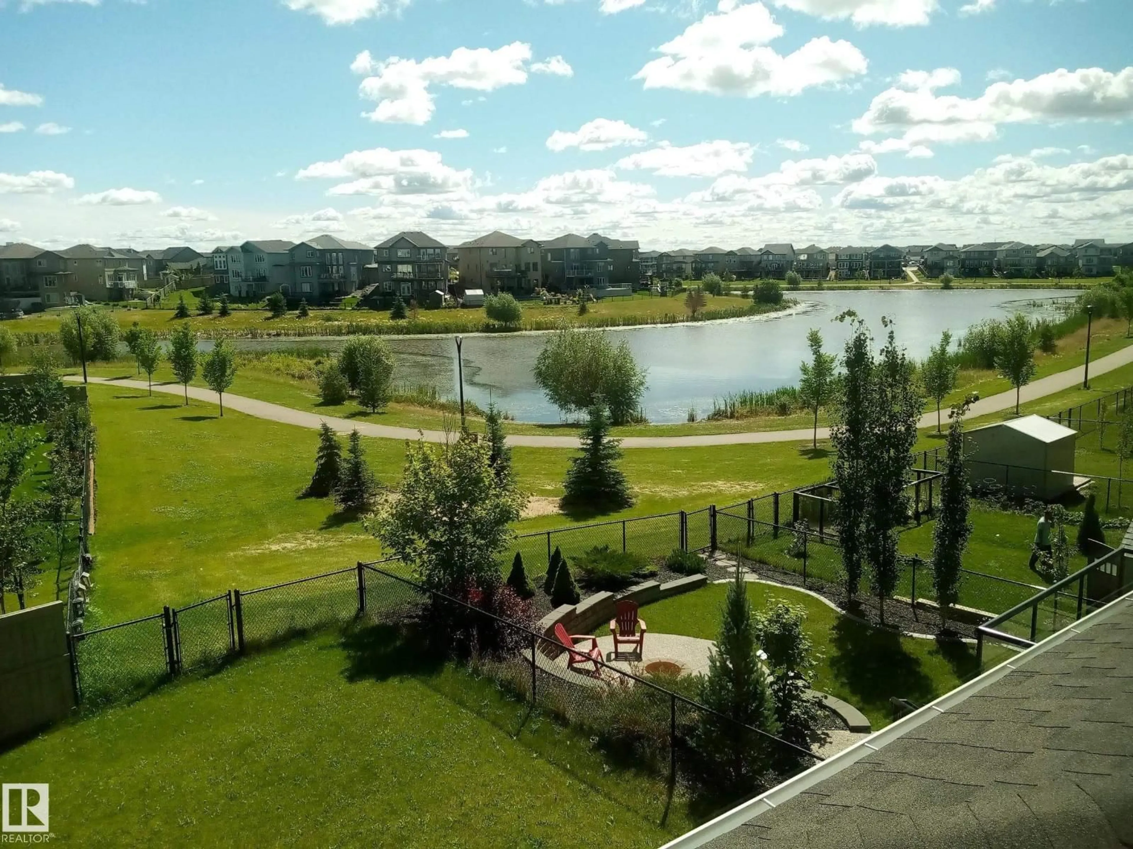 A pic from outside/outdoor area/front of a property/back of a property/a pic from drone, water/lake/river/ocean view for NW - 17931 78 ST, Edmonton Alberta T5Z0L7