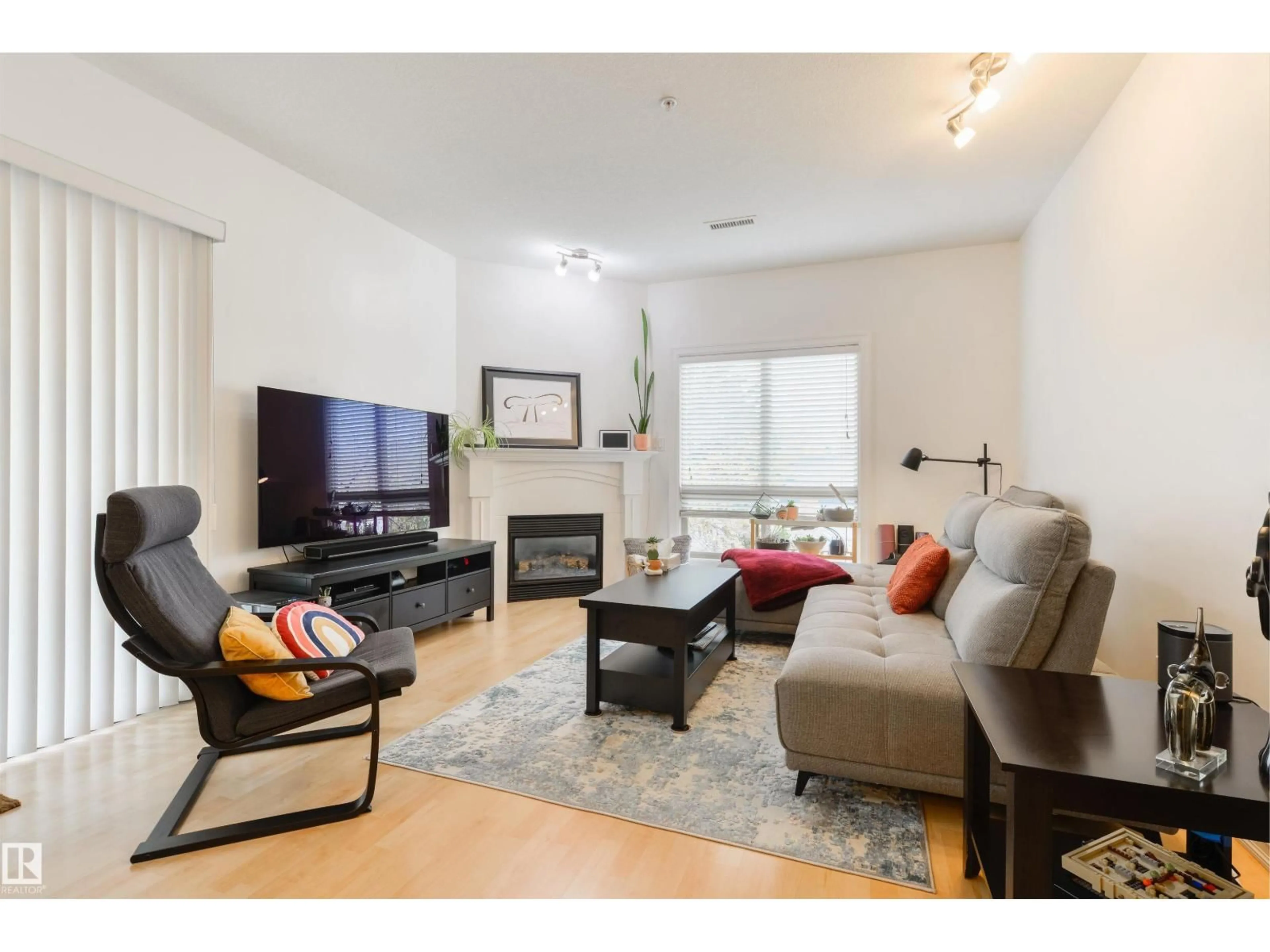 Living room with furniture, wood/laminate floor for #304 - 10630 78 AV, Edmonton Alberta T6E1P5