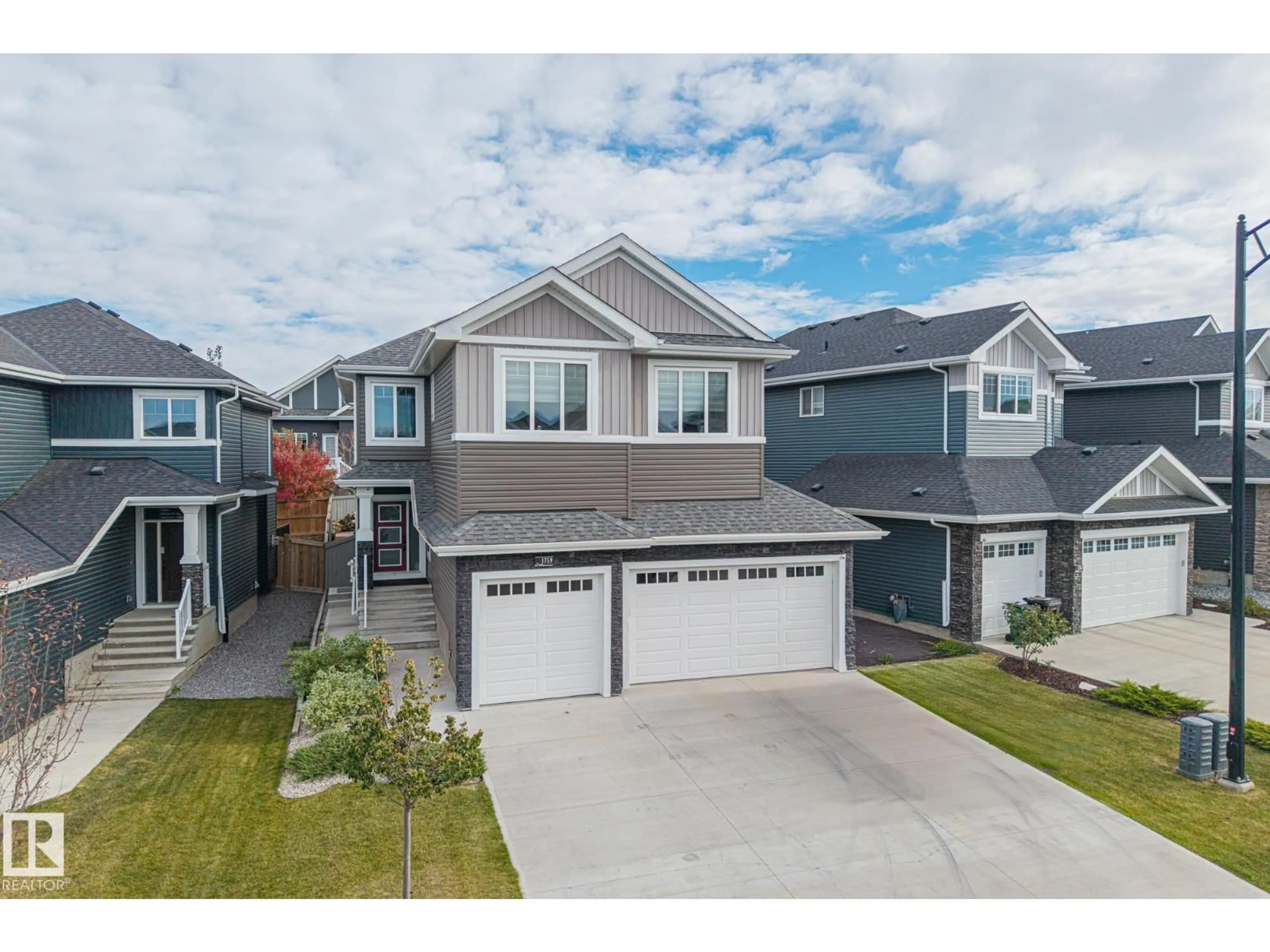 A pic from outside/outdoor area/front of a property/back of a property/a pic from drone, street for 1759 TANAGER CL, Edmonton Alberta T5S0N2