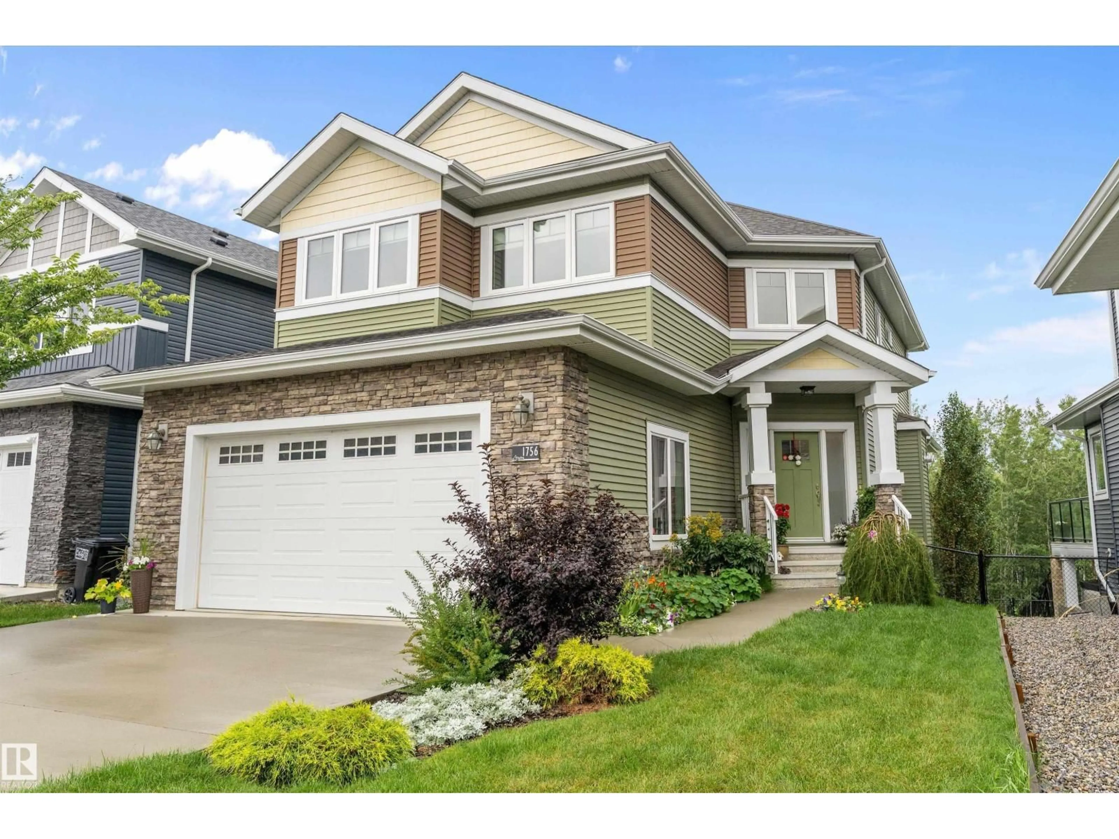 Home with vinyl exterior material, street for 1756 TANAGER CL, Edmonton Alberta T5S0N2