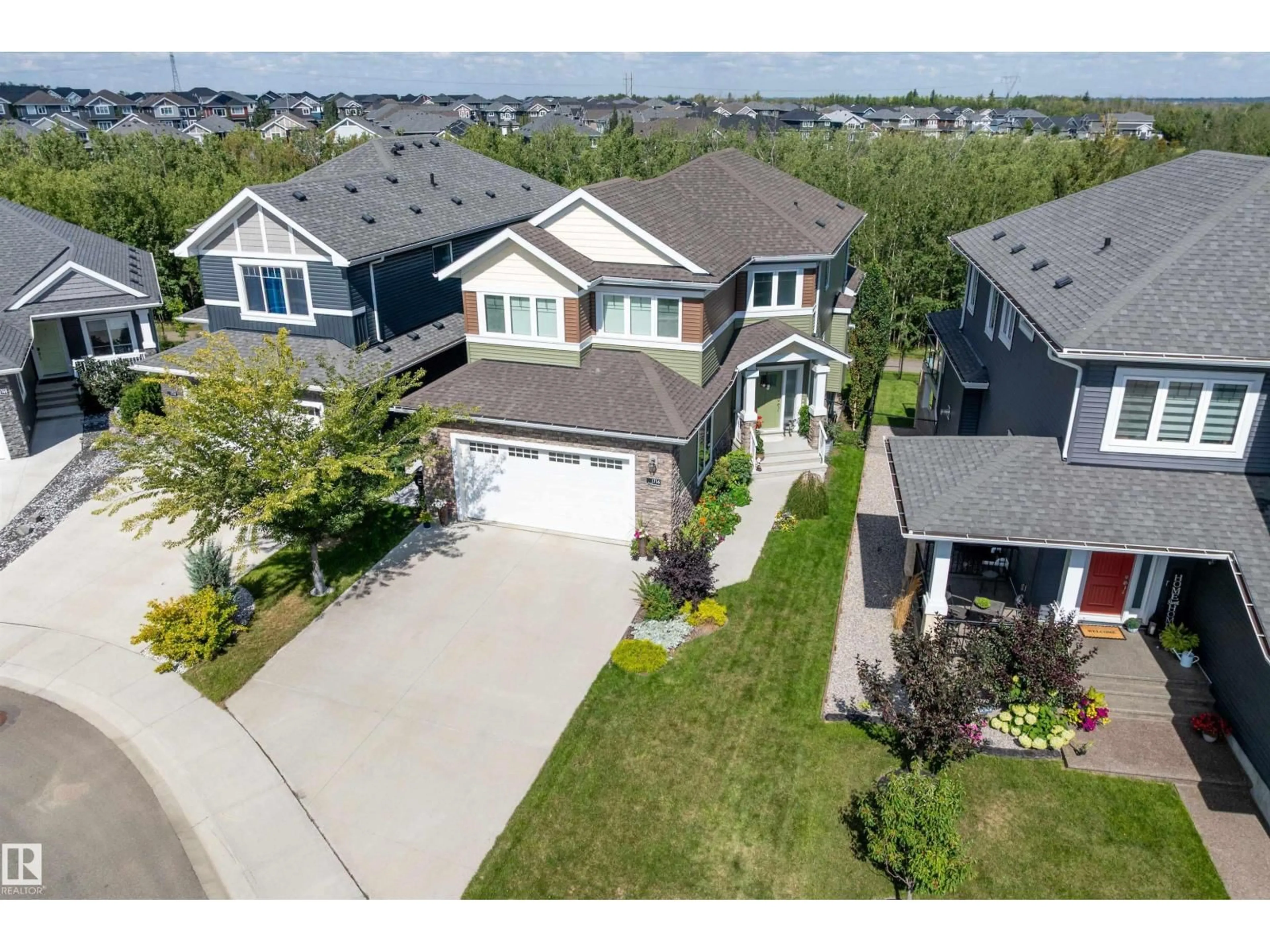 A pic from outside/outdoor area/front of a property/back of a property/a pic from drone, street for 1756 TANAGER CL, Edmonton Alberta T5S0N2