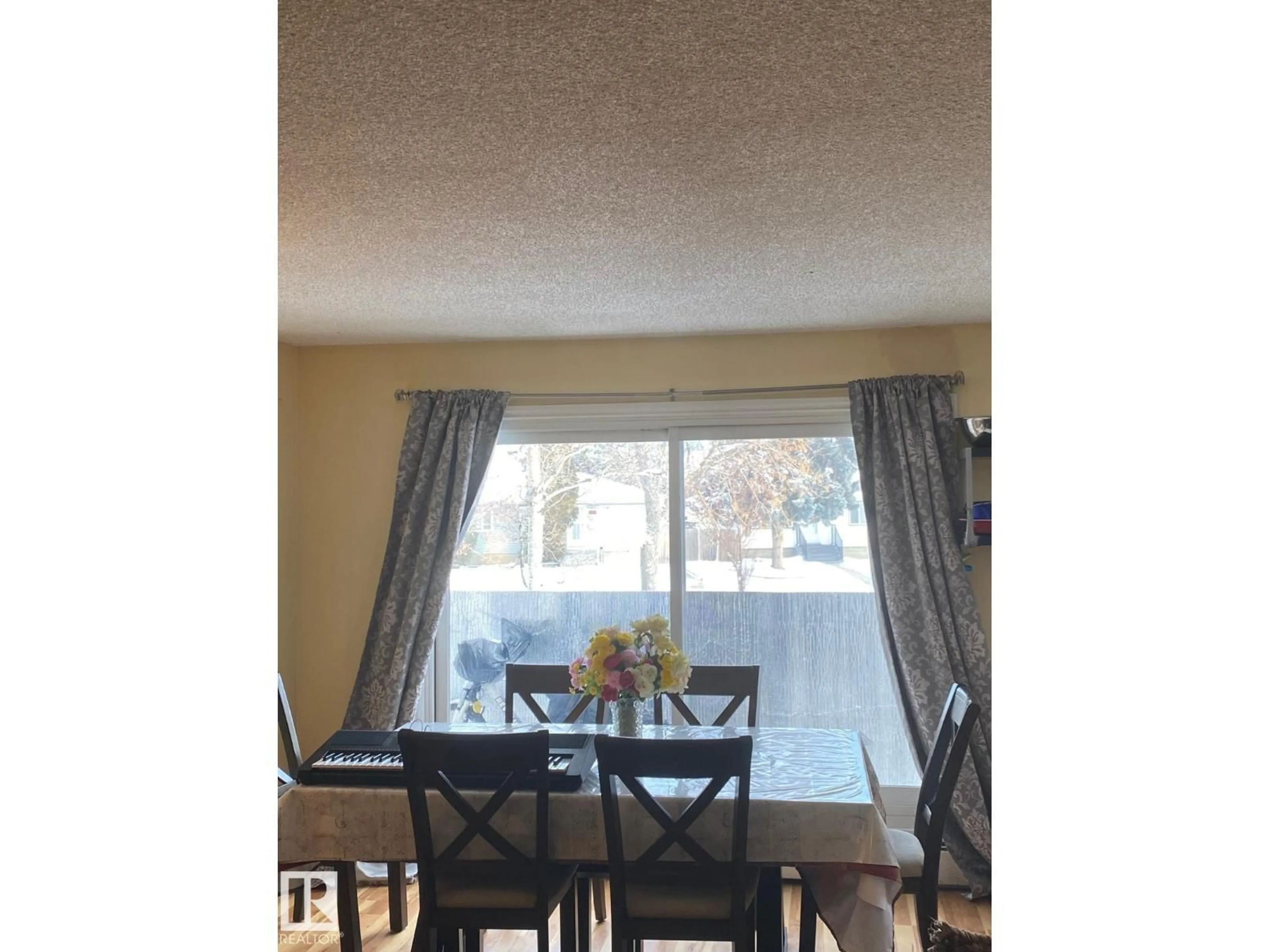 Dining room, wood/laminate floor for 8930 149 ST, Edmonton Alberta T5R1B8