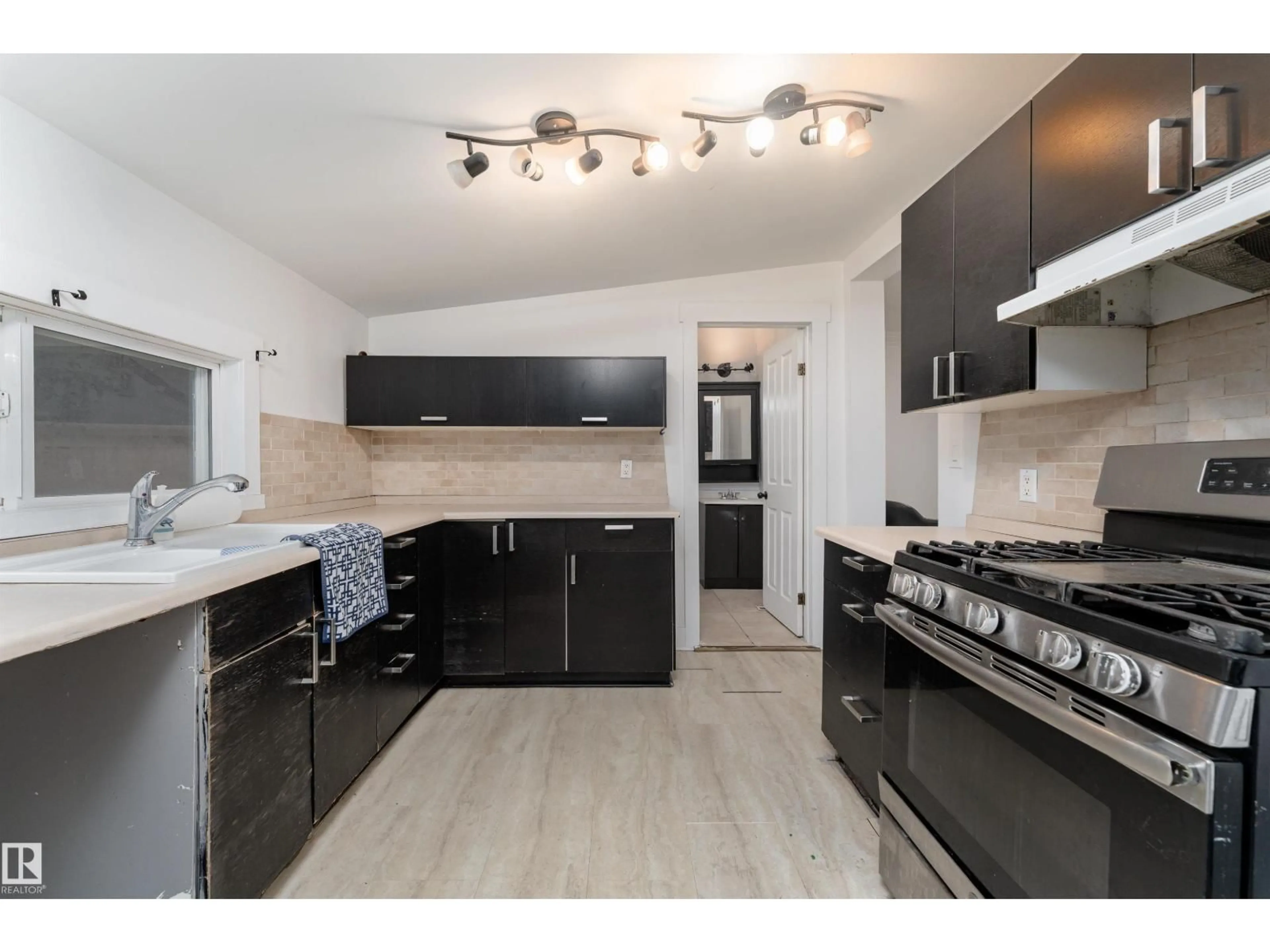 Open concept kitchen, unknown for 12018 95 ST NW, Edmonton Alberta T5G1M7