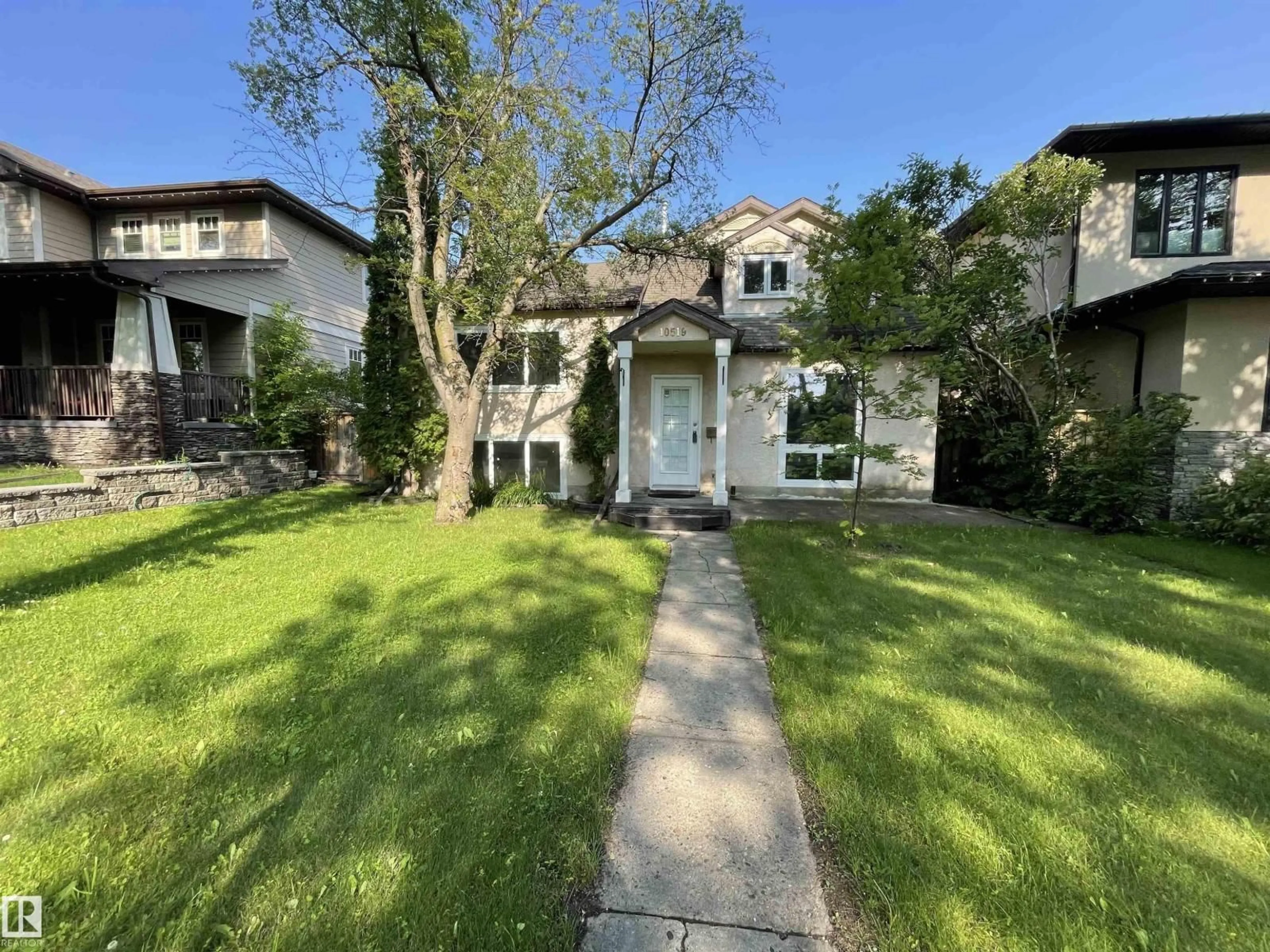 A pic from outside/outdoor area/front of a property/back of a property/a pic from drone, street for NW - 10519 140 ST, Edmonton Alberta T5N2M1