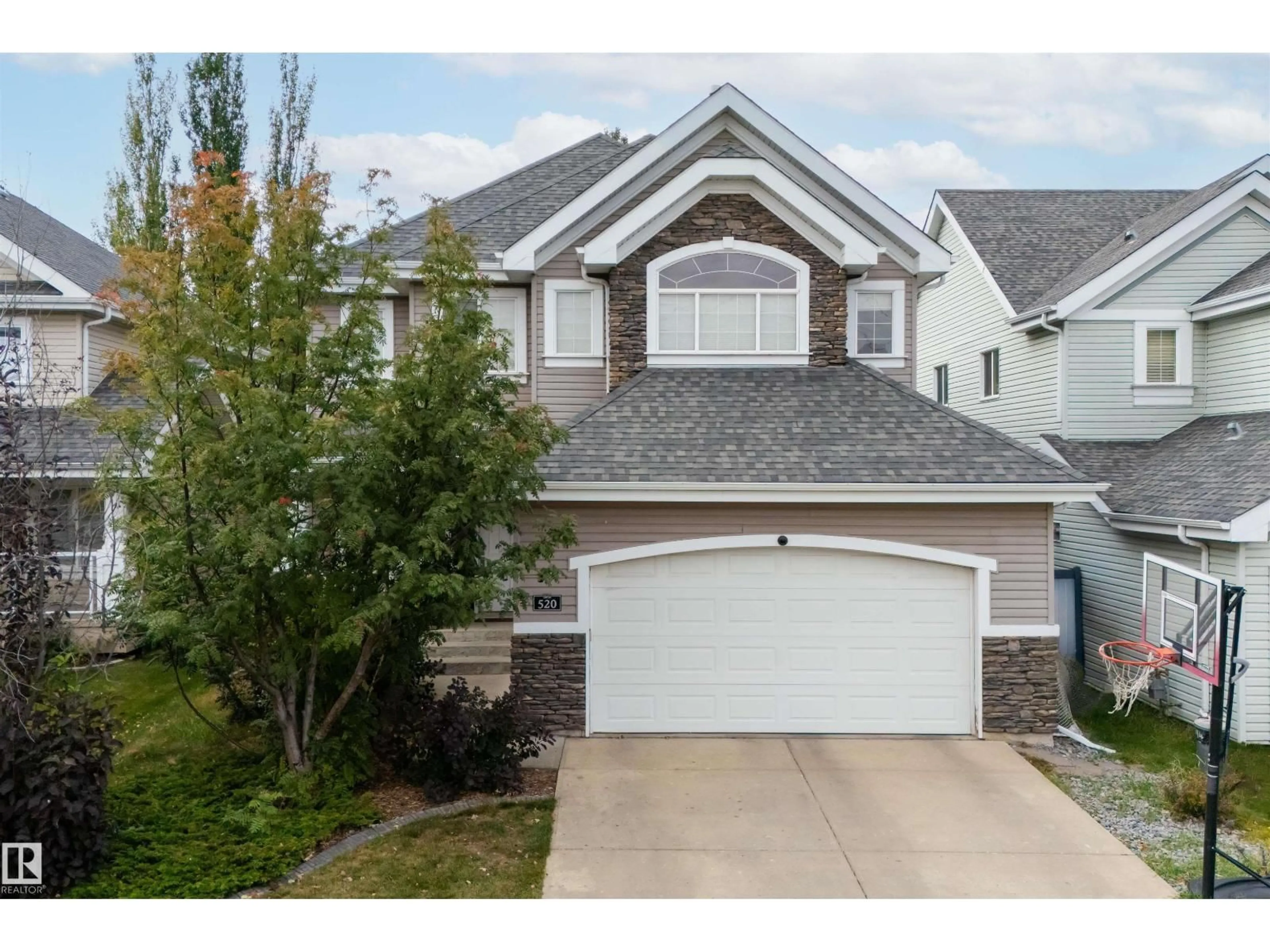 Home with vinyl exterior material, street for 520 STEWART CR, Edmonton Alberta T6X0A8