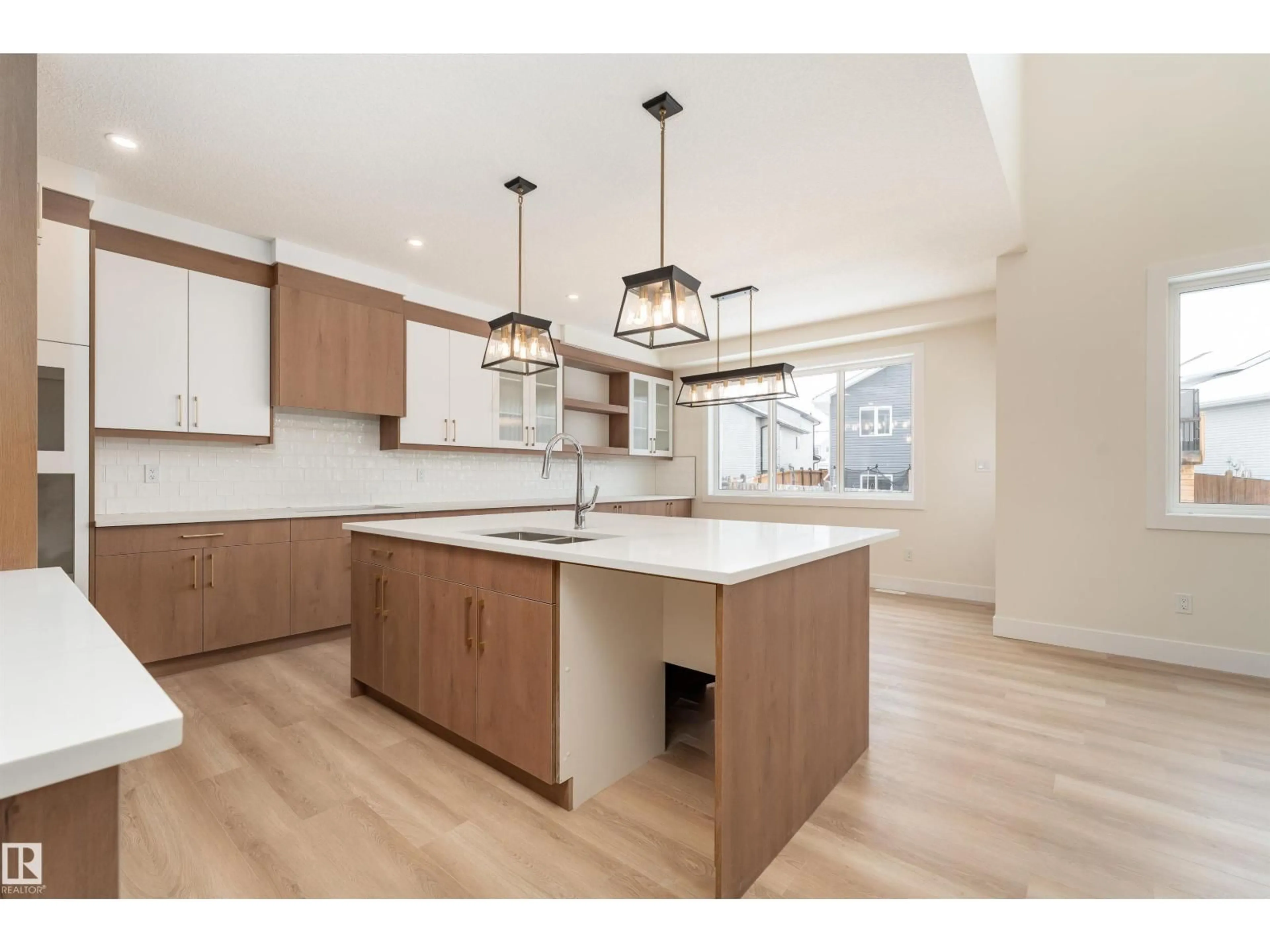 Open concept kitchen, wood/laminate floor for 60 LANDING TRAILS DR, Gibbons Alberta T0A1N0