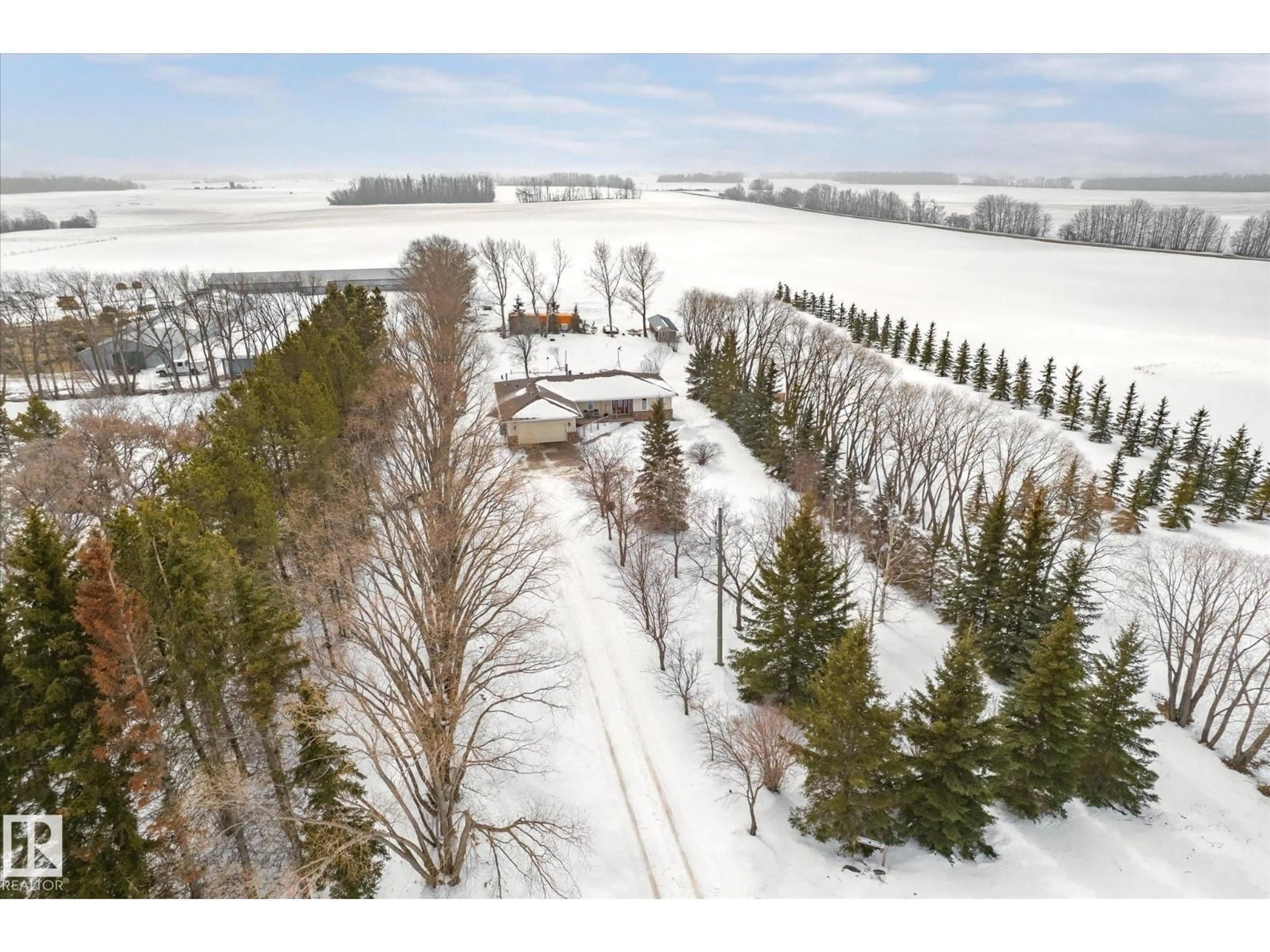 A pic from outside/outdoor area/front of a property/back of a property/a pic from drone, water/lake/river/ocean view for 24327 SH 651, Rural Sturgeon County Alberta T0G1L0