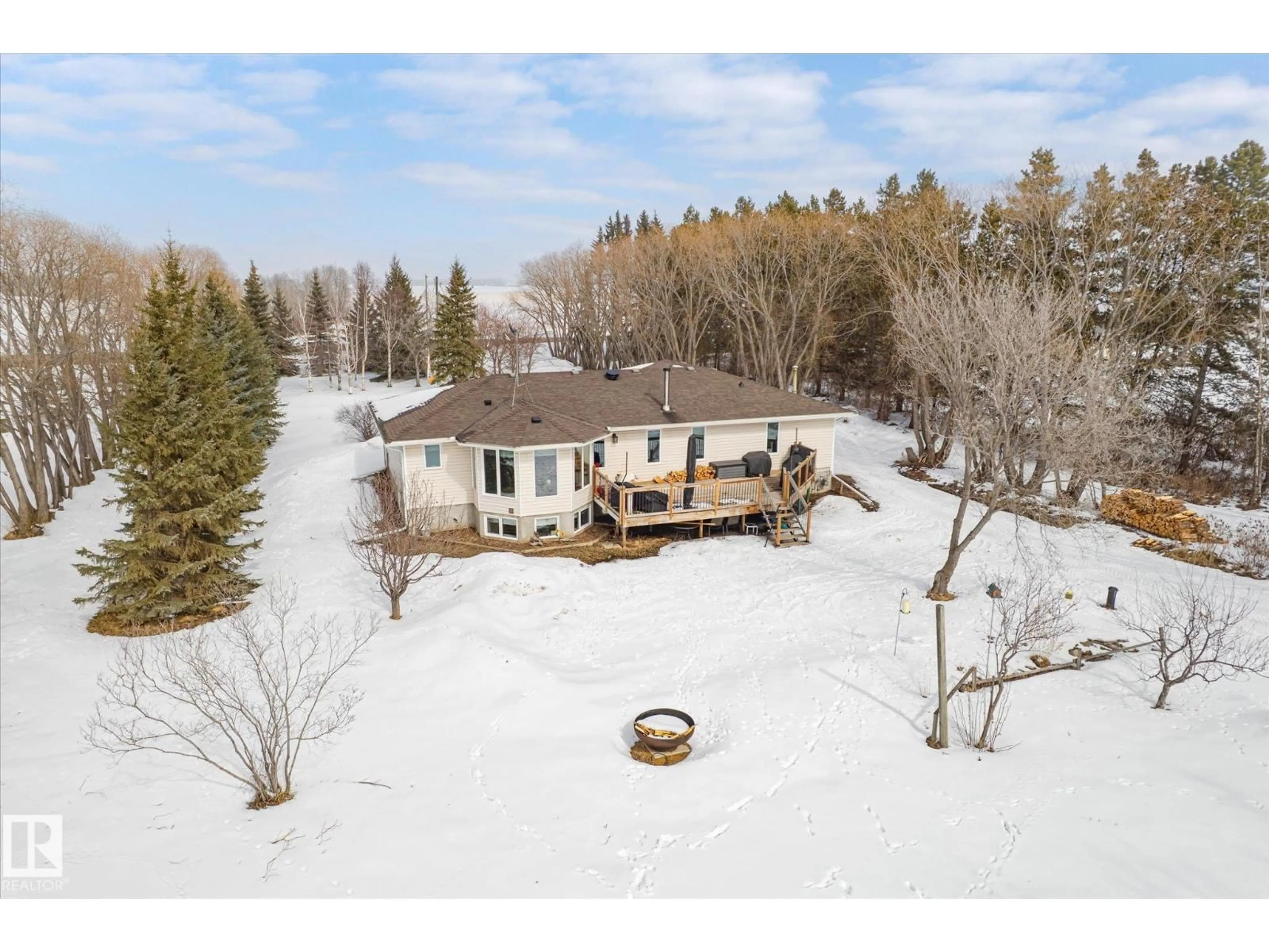 A pic from outside/outdoor area/front of a property/back of a property/a pic from drone, water/lake/river/ocean view for 24327 SH 651, Rural Sturgeon County Alberta T0G1L0