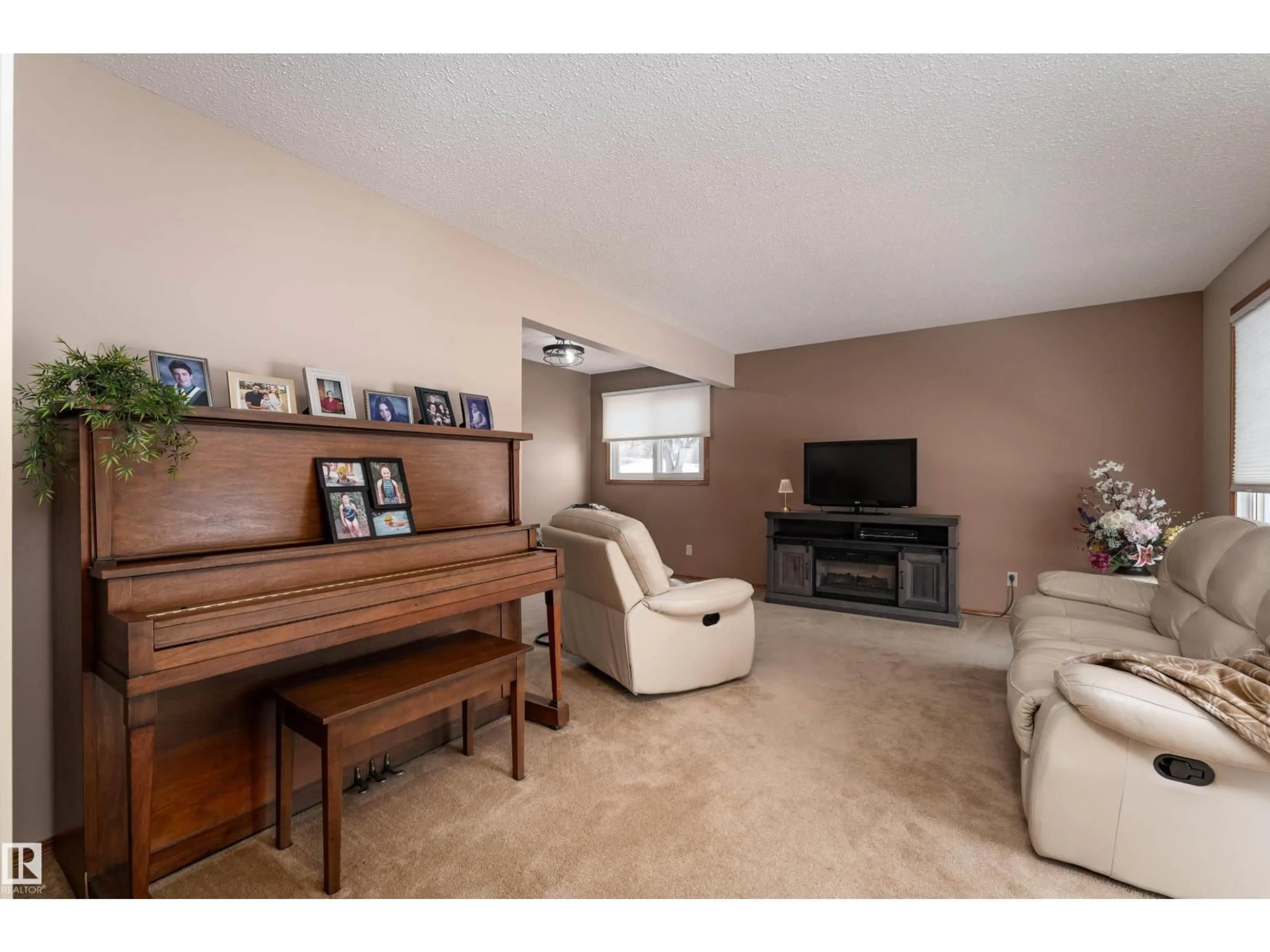 Living room with furniture, unknown for 8326 98 AV, Fort Saskatchewan Alberta T8L3G3