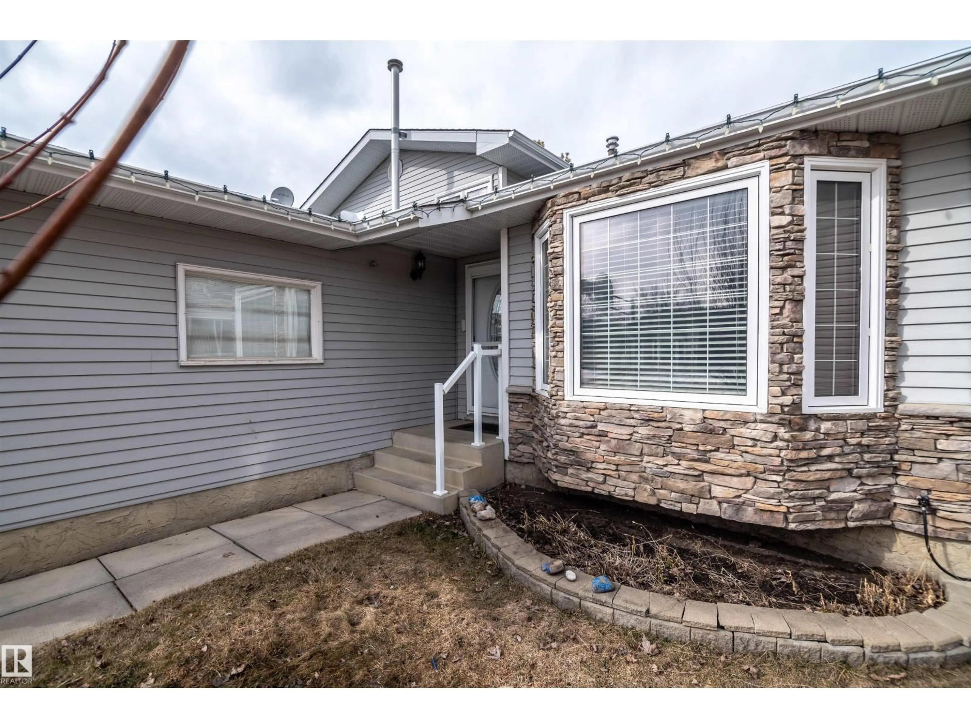 Home with vinyl exterior material, street for 18 MATHIAS AV, Spruce Grove Alberta T7X2S2