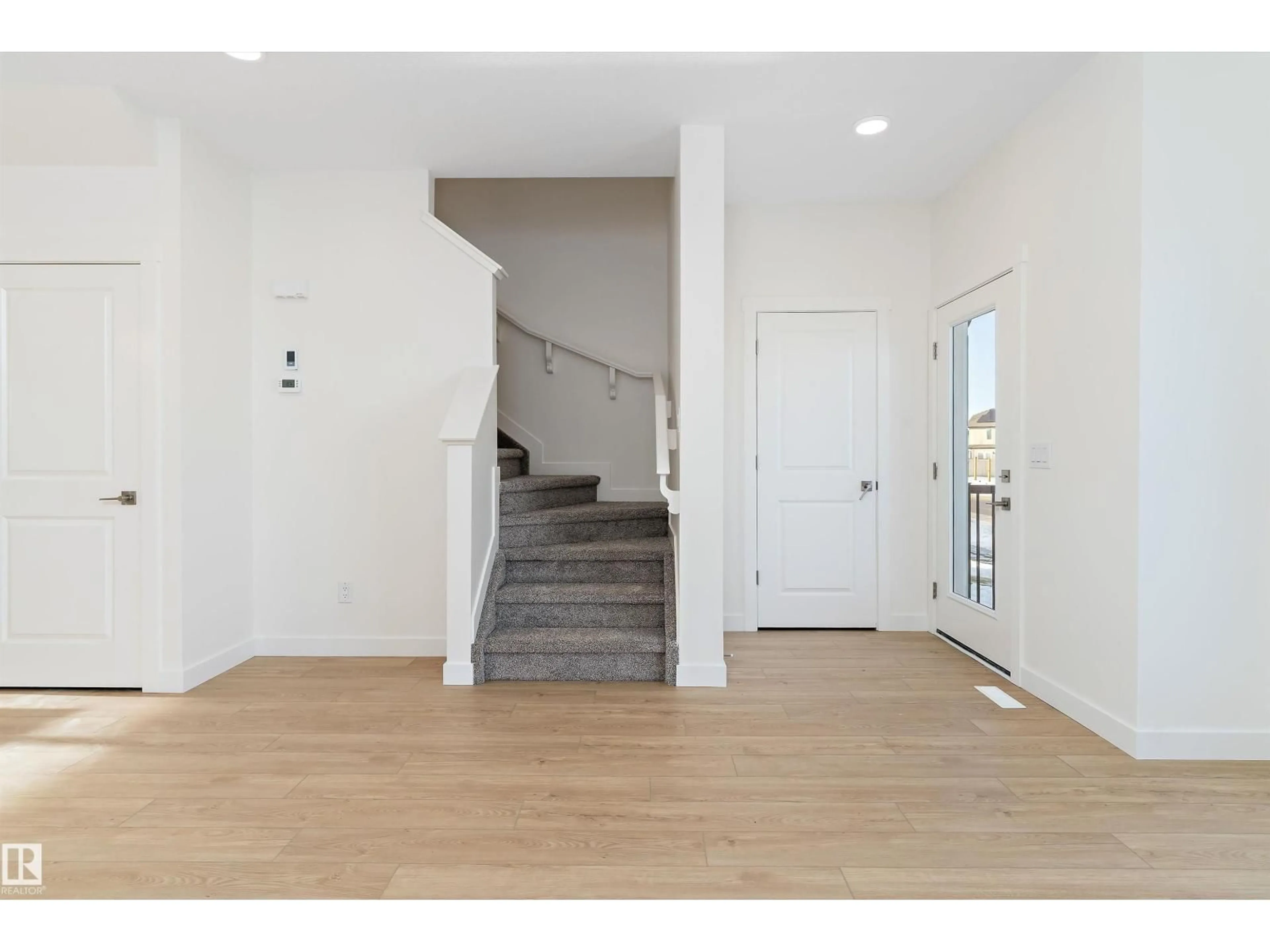 Indoor foyer for 18709 18A AV, Edmonton Alberta T6N0B2