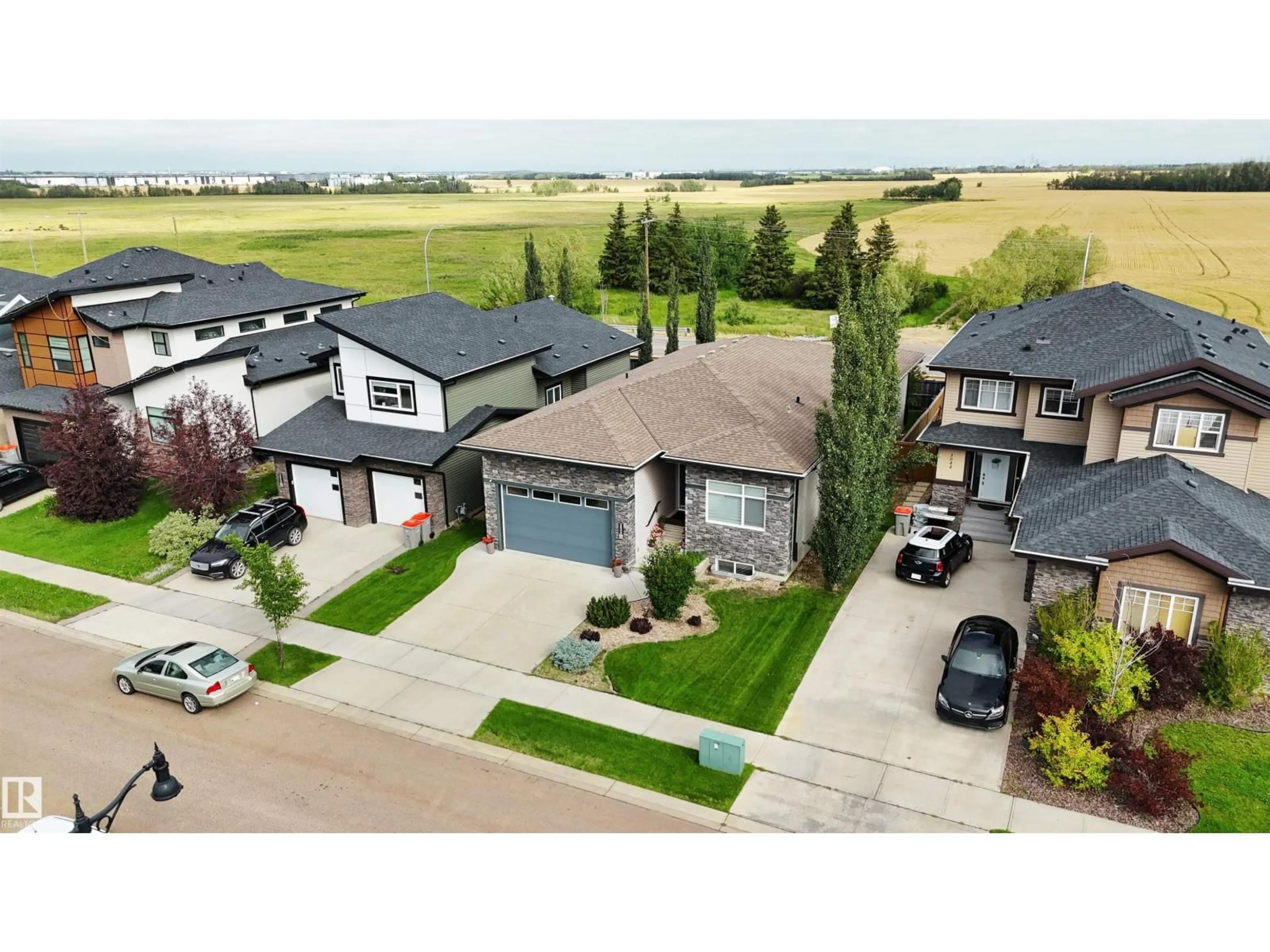 A pic from outside/outdoor area/front of a property/back of a property/a pic from drone, street for 3036 58 AV, Rural Leduc County Alberta T4X0X9