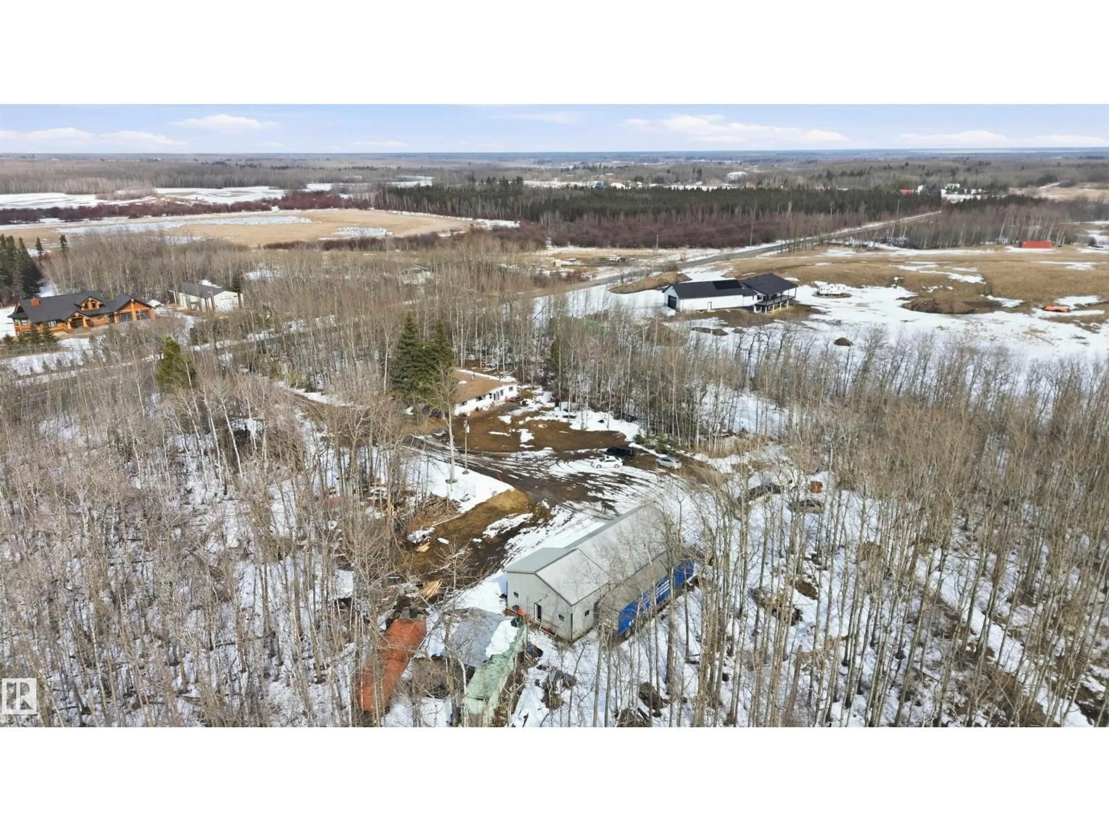 A pic from outside/outdoor area/front of a property/back of a property/a pic from drone, unknown for 22443 TWP ROAD 512, Rural Strathcona County Alberta T8C1H3