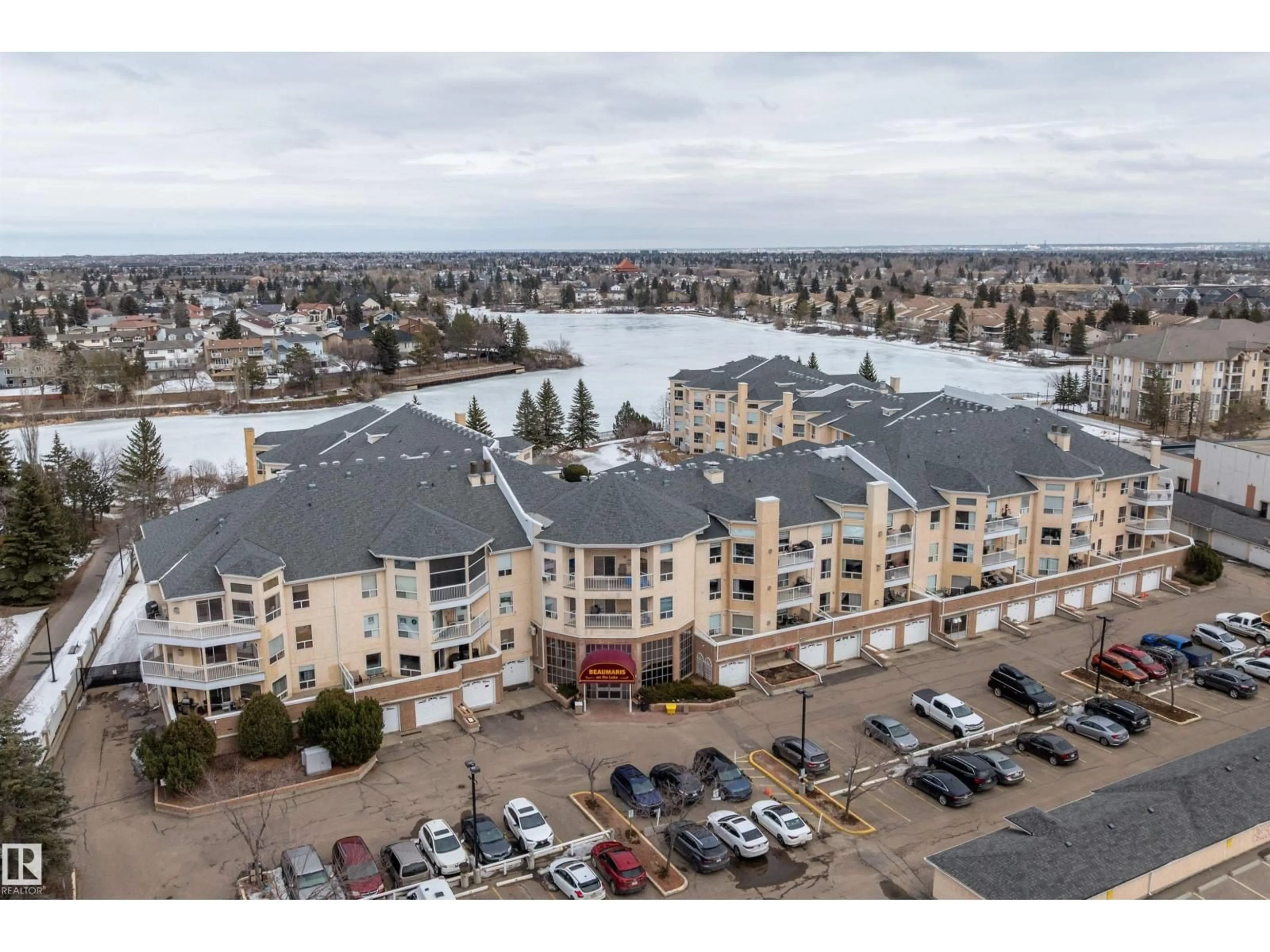 A pic from outside/outdoor area/front of a property/back of a property/a pic from drone, water/lake/river/ocean view for 124 15499 CASTLE DOWNS RD NW, Edmonton Alberta T5X5Y3