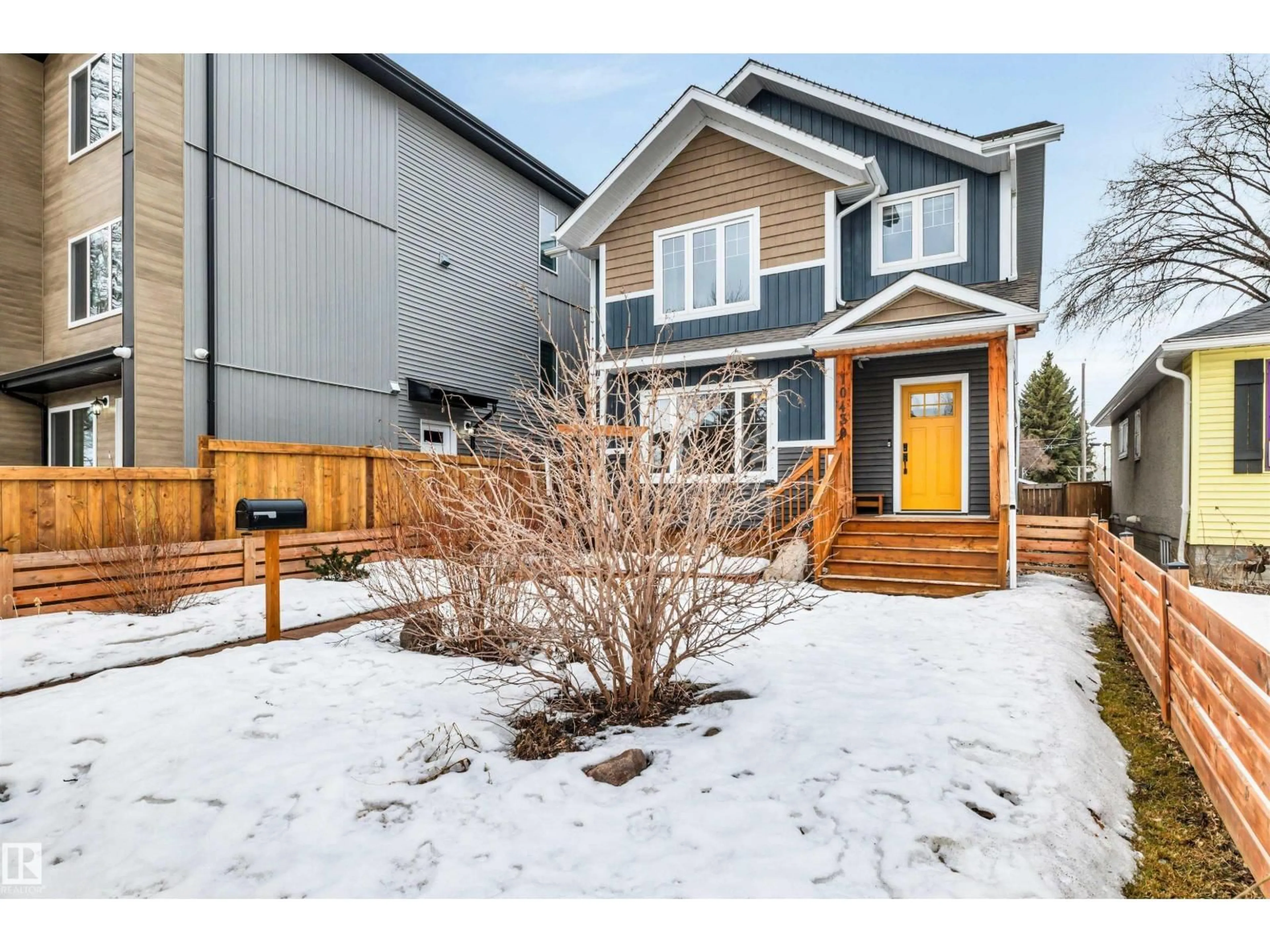 Home with vinyl exterior material, street for 10430 148 ST, Edmonton Alberta T5M3G8