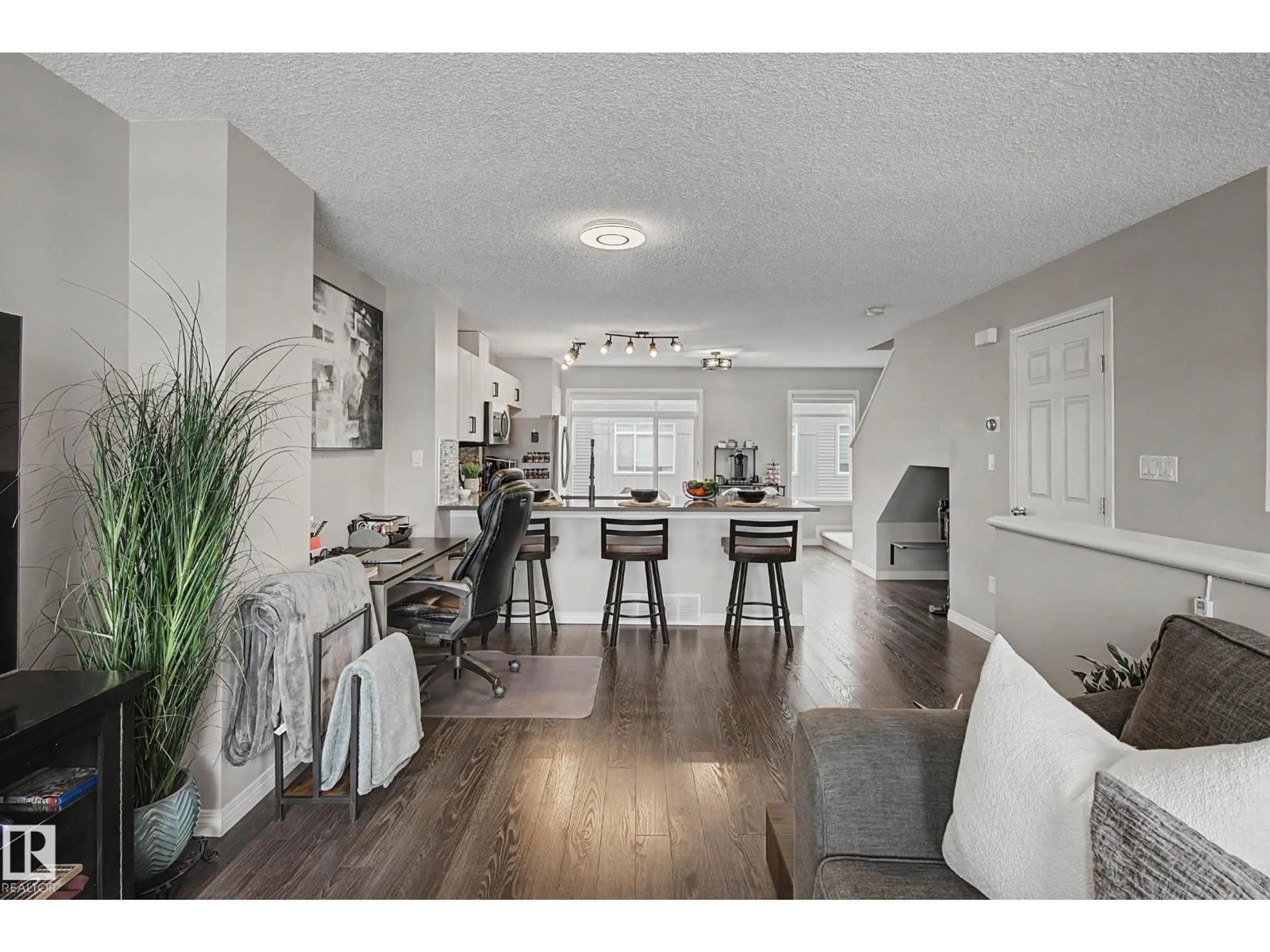 Open concept kitchen, wood/laminate floor for #51 - 7503 GETTY GA, Edmonton Alberta T5T4S8