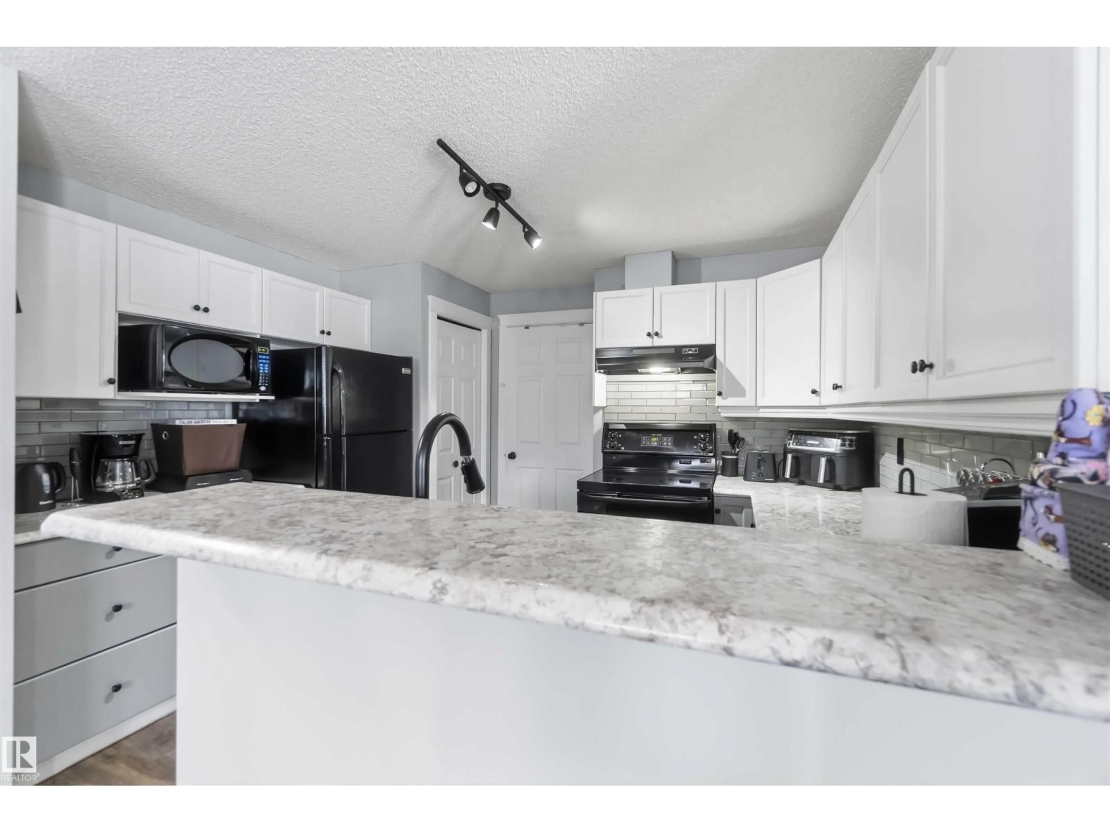 Open concept kitchen, unknown for SW - #11 1179 SUMMERSIDE DR, Edmonton Alberta T6X1K1