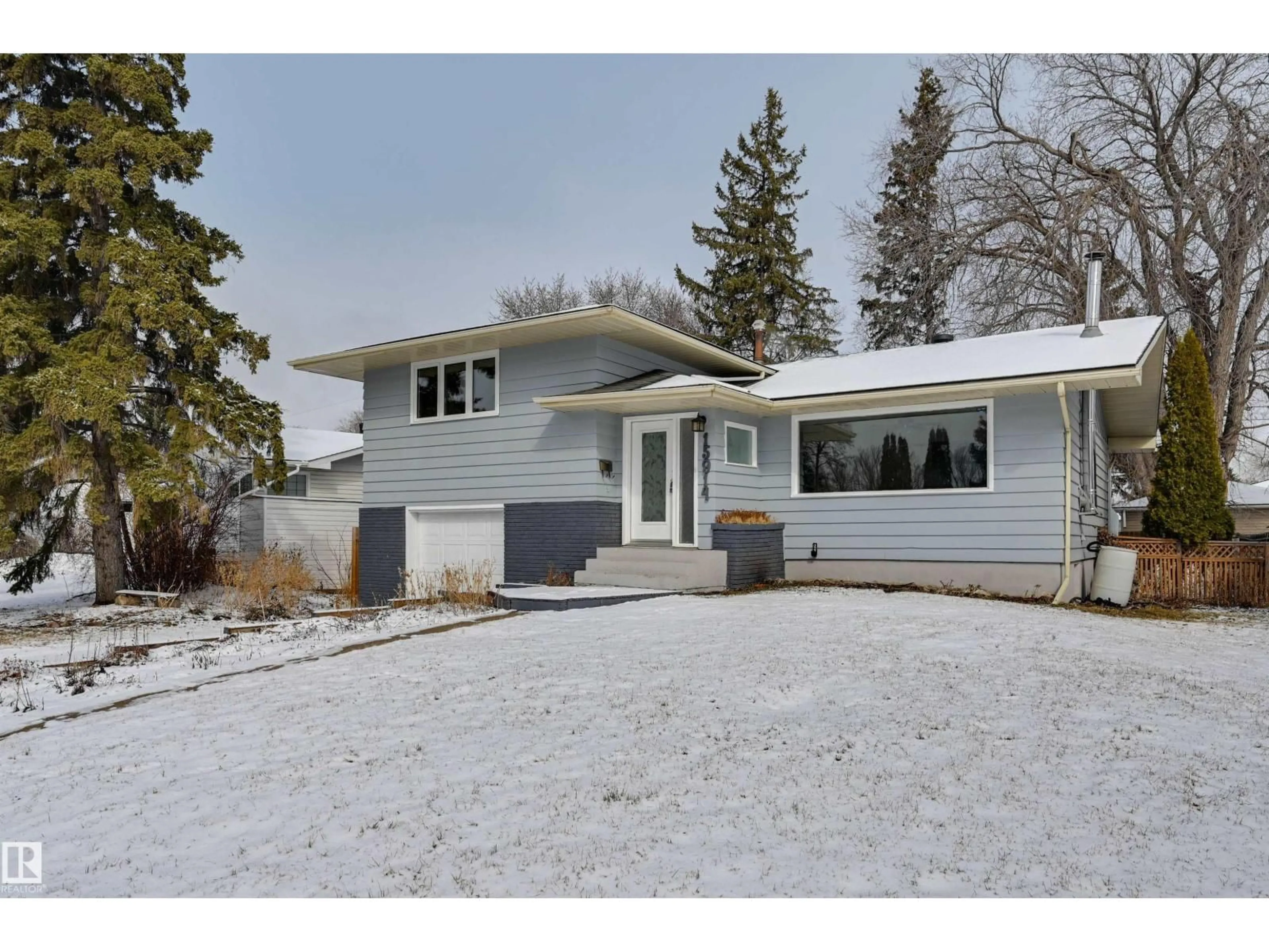 Home with vinyl exterior material, street for 15914 92A AV, Edmonton Alberta T5R5G3