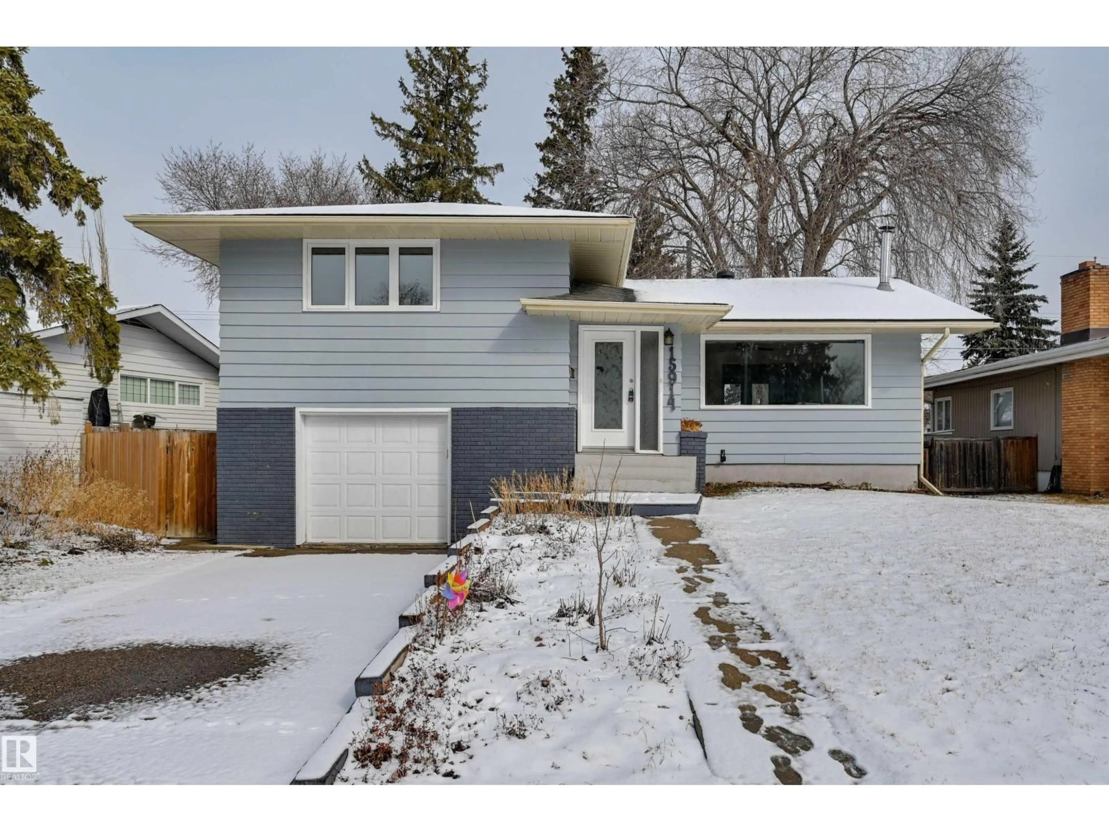 Home with vinyl exterior material, street for 15914 92A AV, Edmonton Alberta T5R5G3