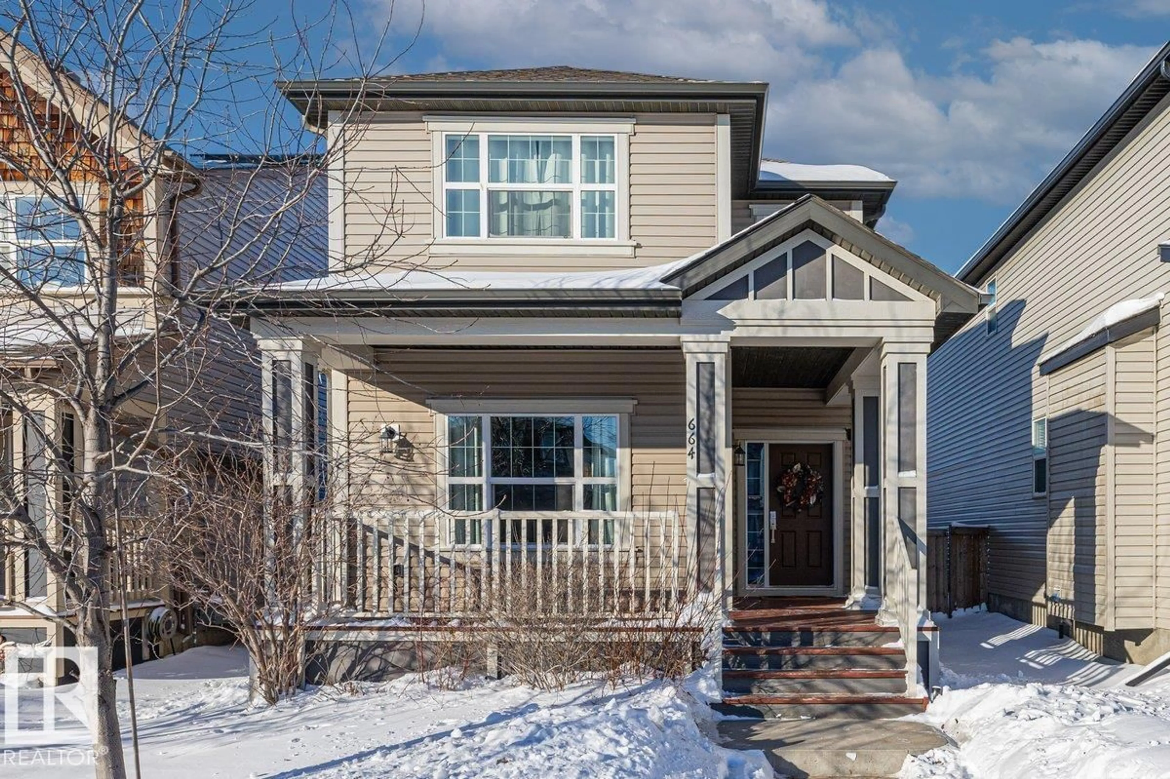 Home with vinyl exterior material, street for 664 SECORD BV, Edmonton Alberta T5T6Z6