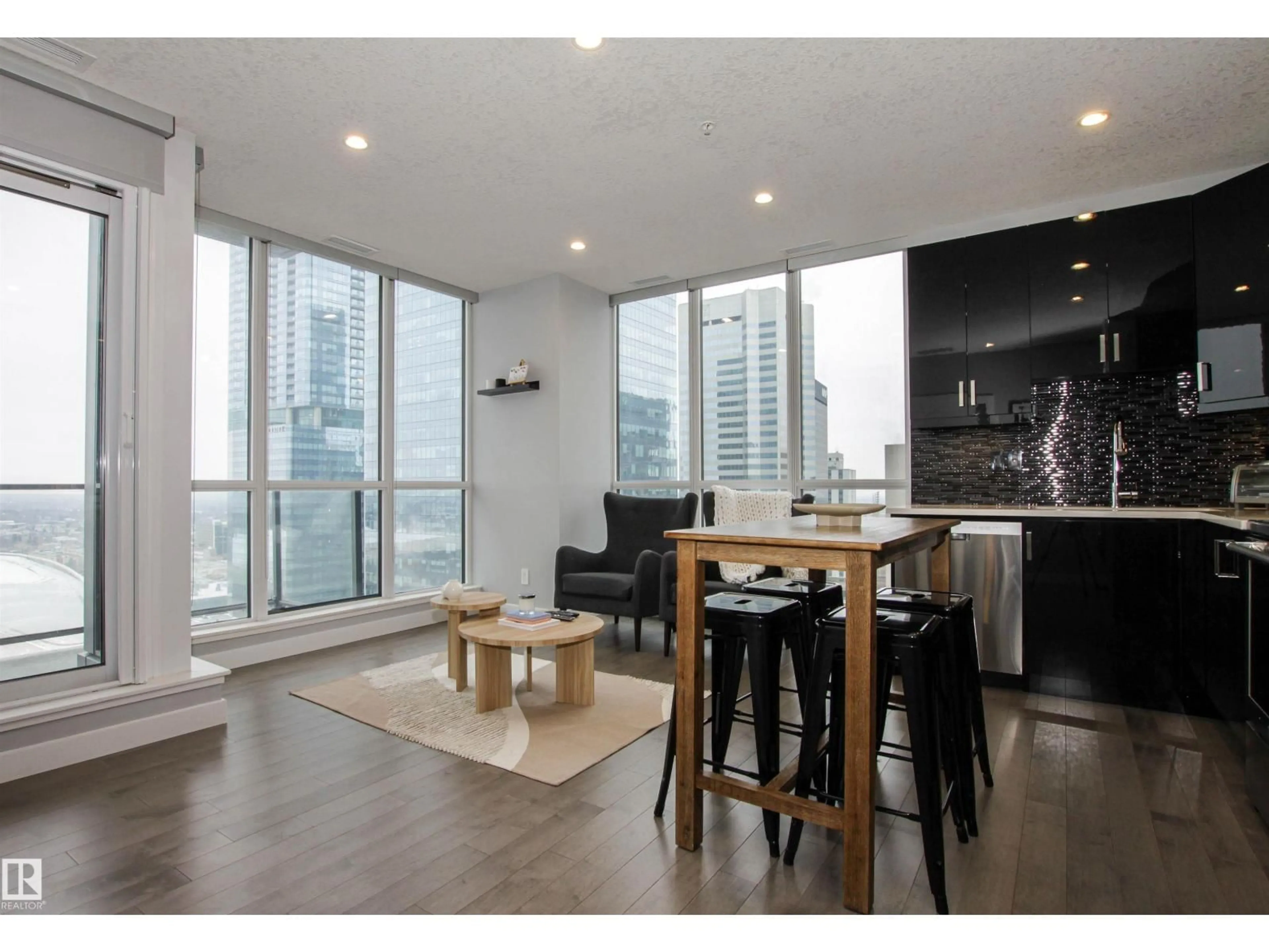 Open concept kitchen, wood/laminate floor for NW - 2003 10238 ST, Edmonton Alberta T5J0G6