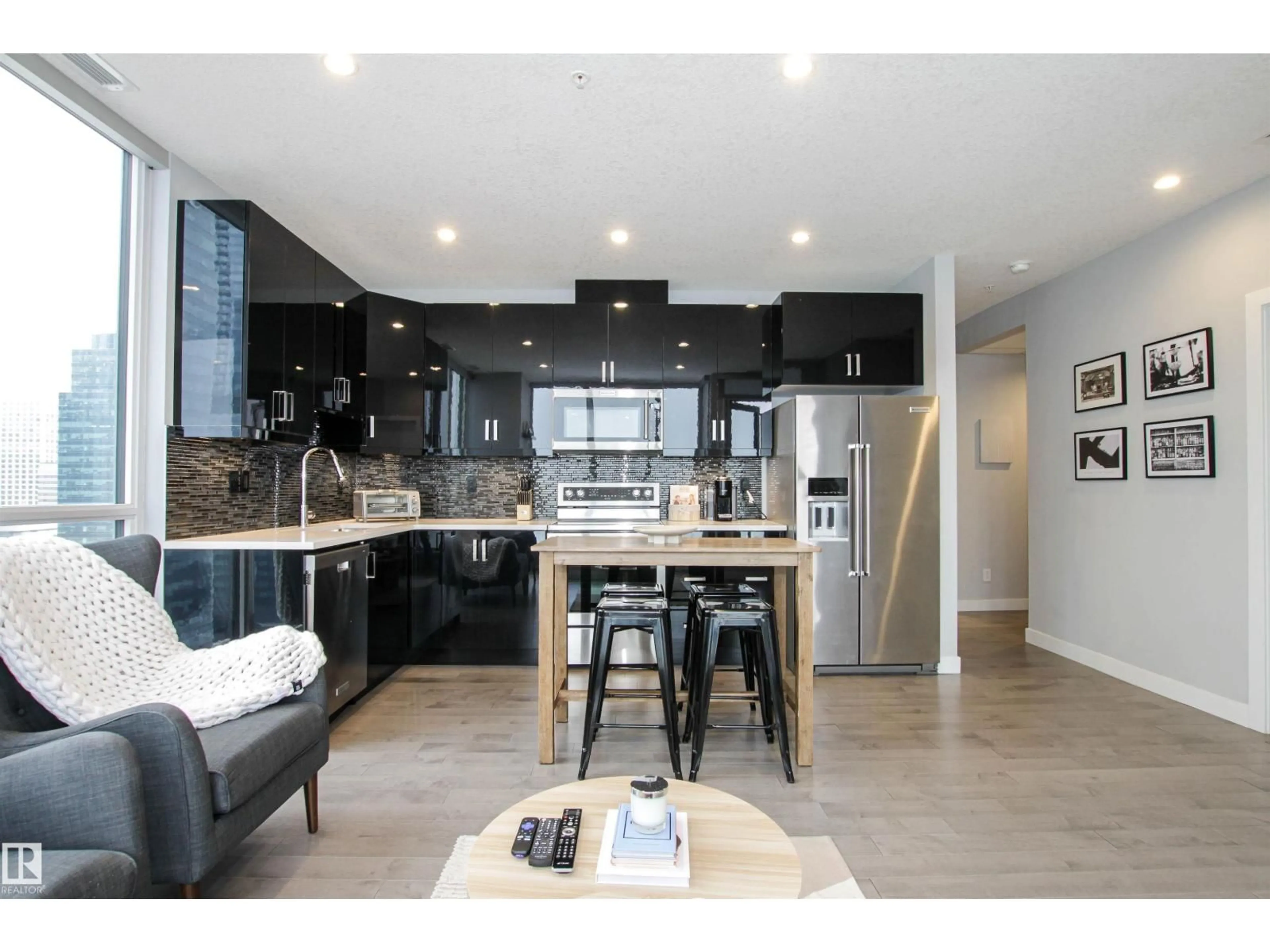 Open concept kitchen, wood/laminate floor for NW - 2003 10238 ST, Edmonton Alberta T5J0G6