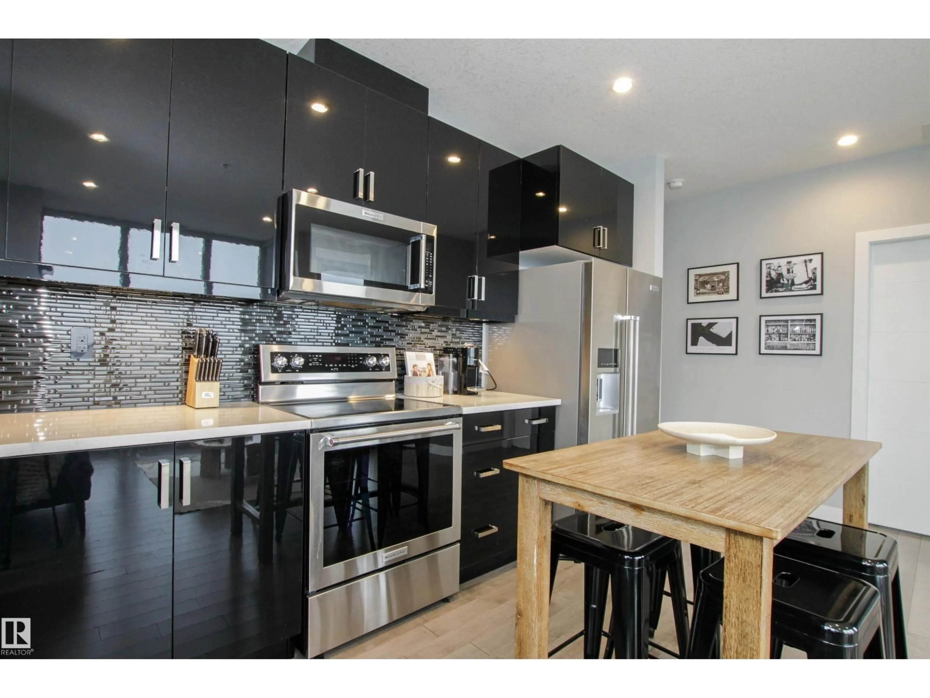 Open concept kitchen, wood/laminate floor for NW - 2003 10238 ST, Edmonton Alberta T5J0G6