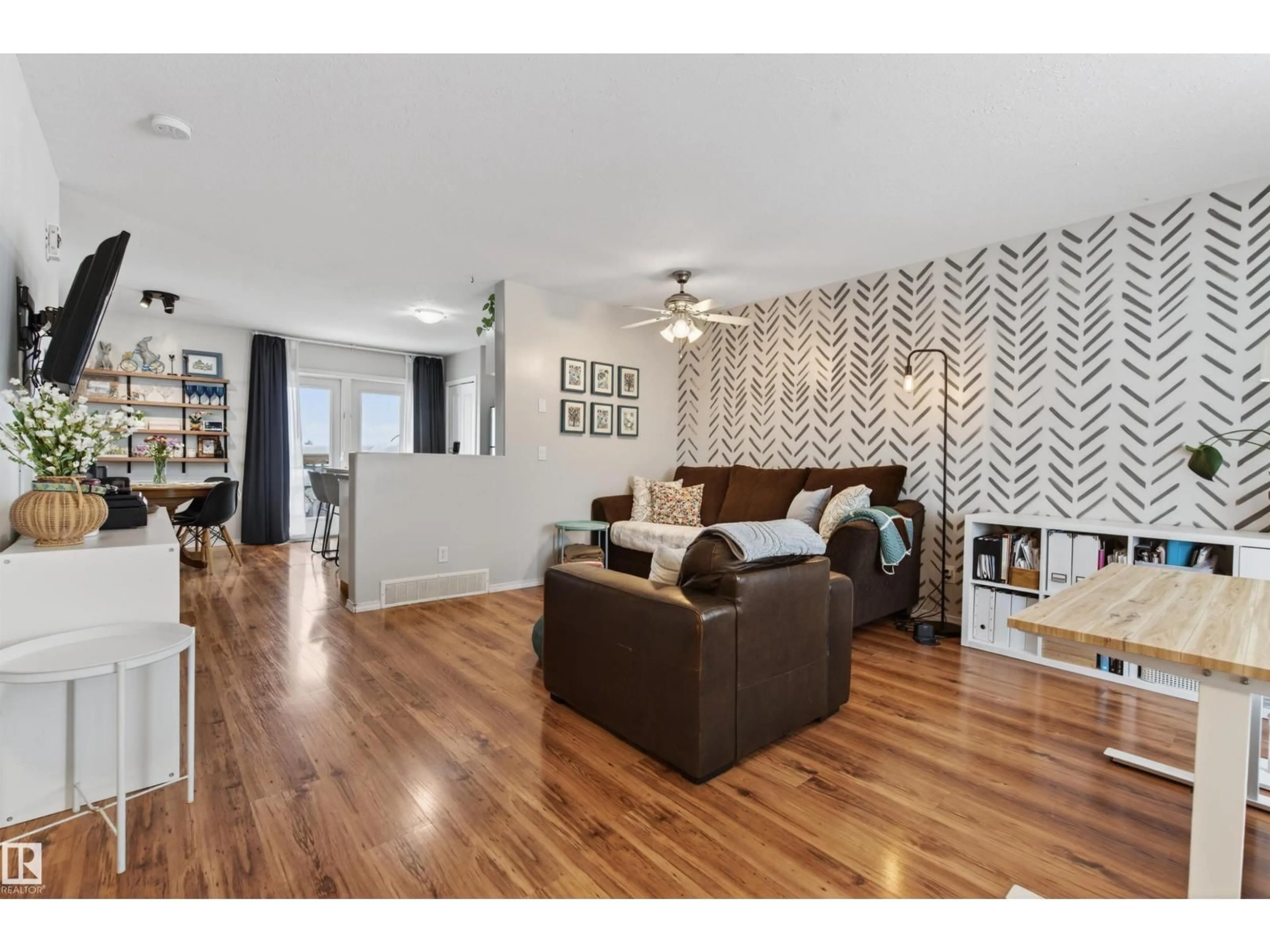 Living room with furniture, wood/laminate floor for 1211 13 ST, Cold Lake Alberta T9M1J4