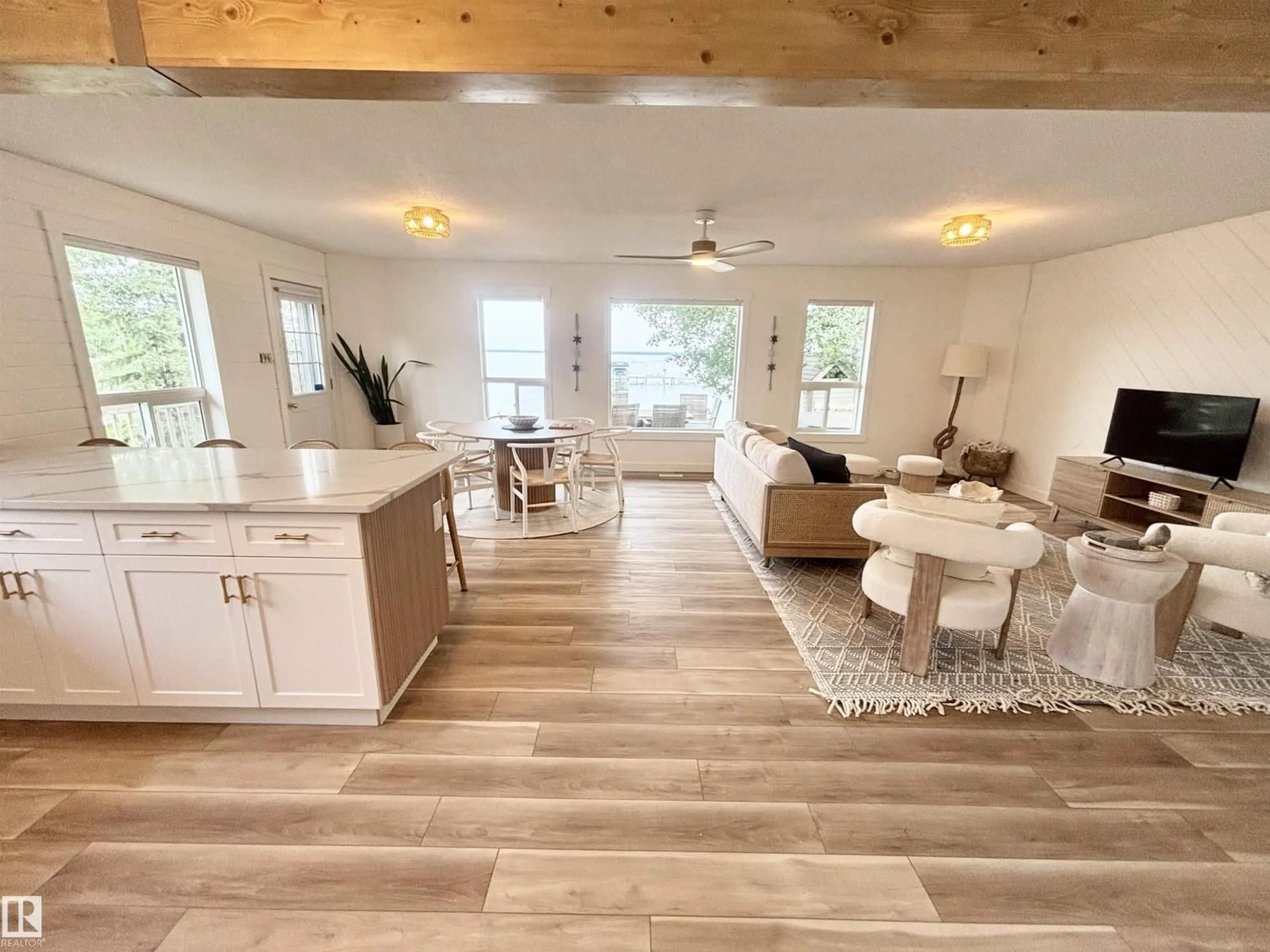 Open concept kitchen, wood/laminate floor for 214 BONNYVILLE BEACH DR, Rural Bonnyville M.D. Alberta T9N2J6