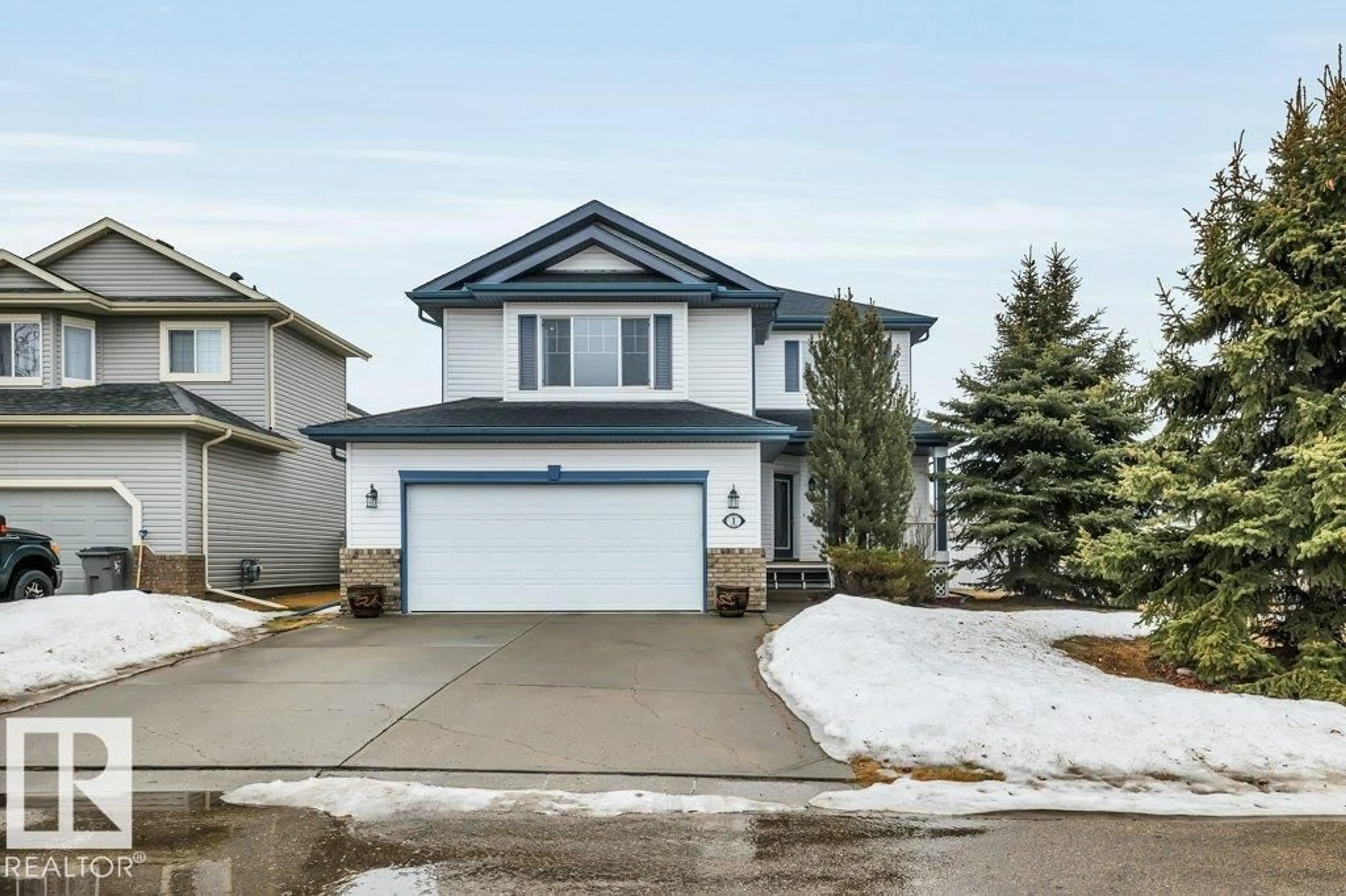 Home with vinyl exterior material, street for 1 ROSEMOUNT, Beaumont Alberta T4X1S3