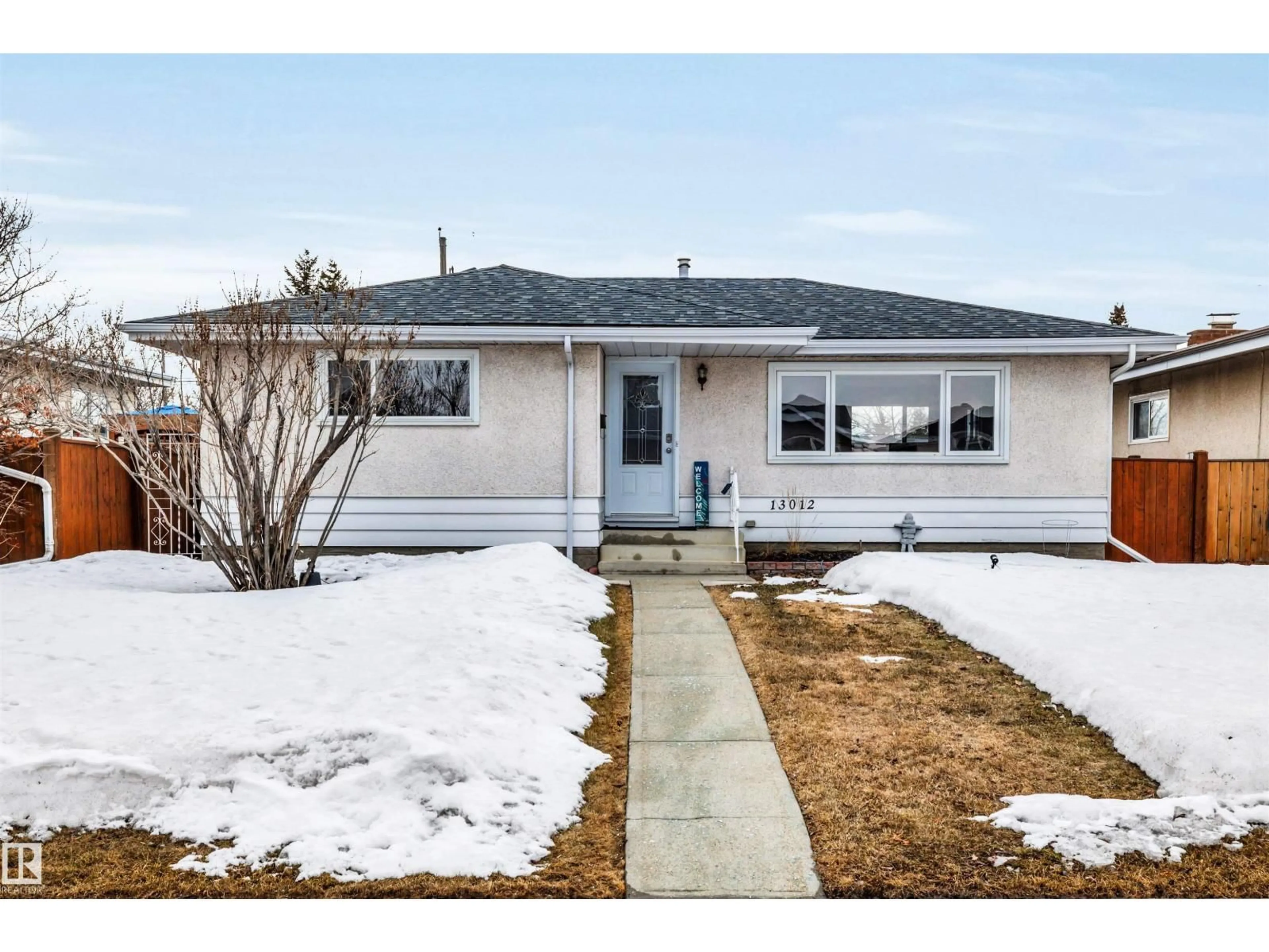 Home with vinyl exterior material, street for NW - 13012 79 ST, Edmonton Alberta T5C1J3