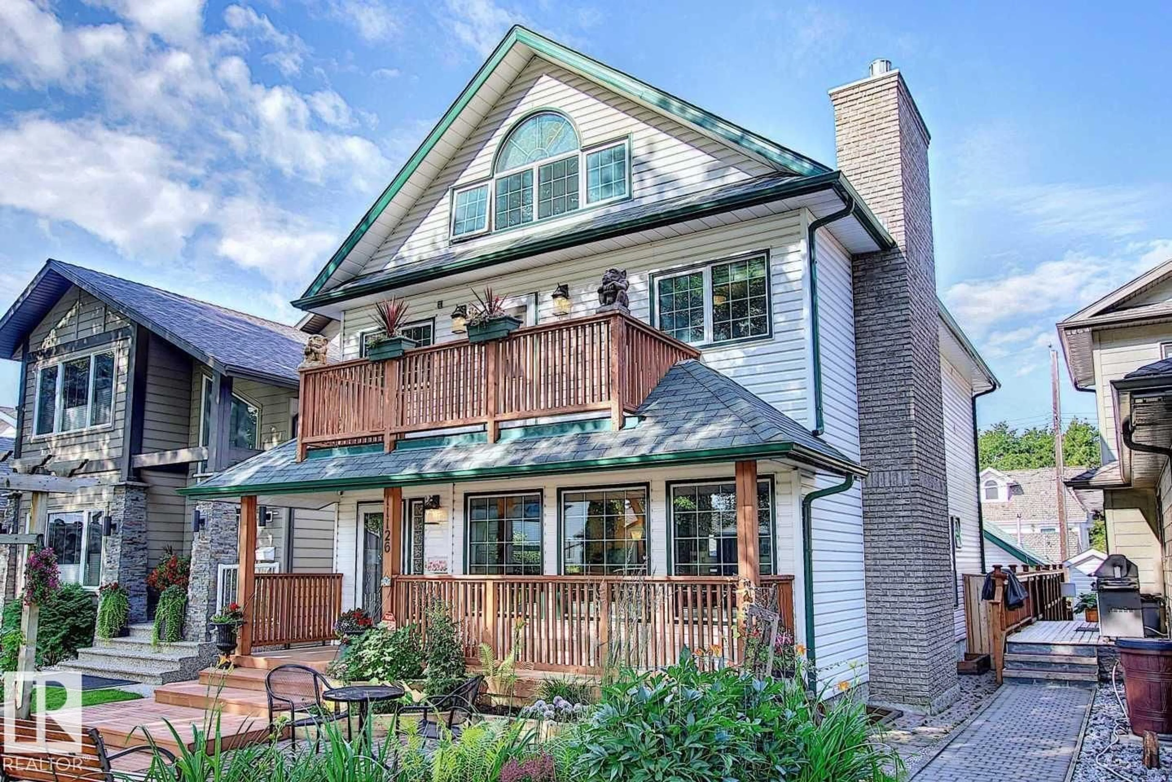 Home with brick exterior material, street for NW - 11126 52 ST, Edmonton Alberta T5W3H7