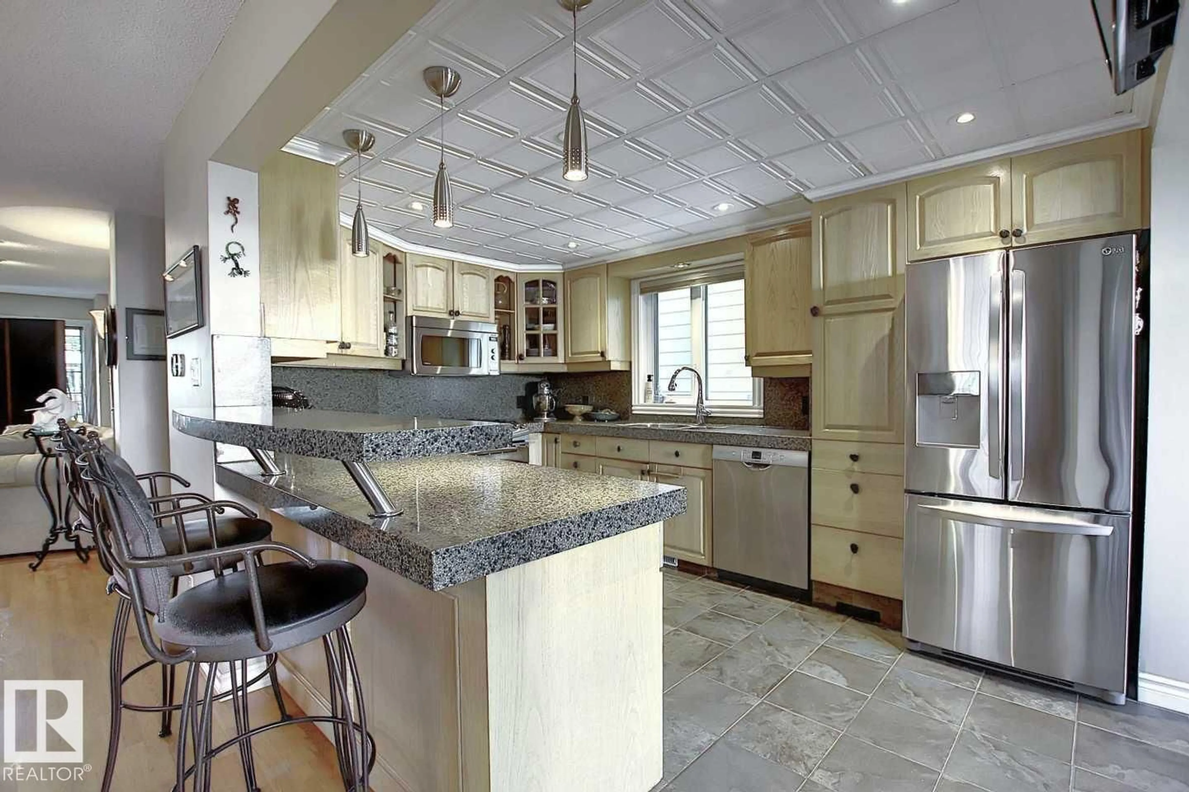 Open concept kitchen, ceramic/tile floor for NW - 11126 52 ST, Edmonton Alberta T5W3H7