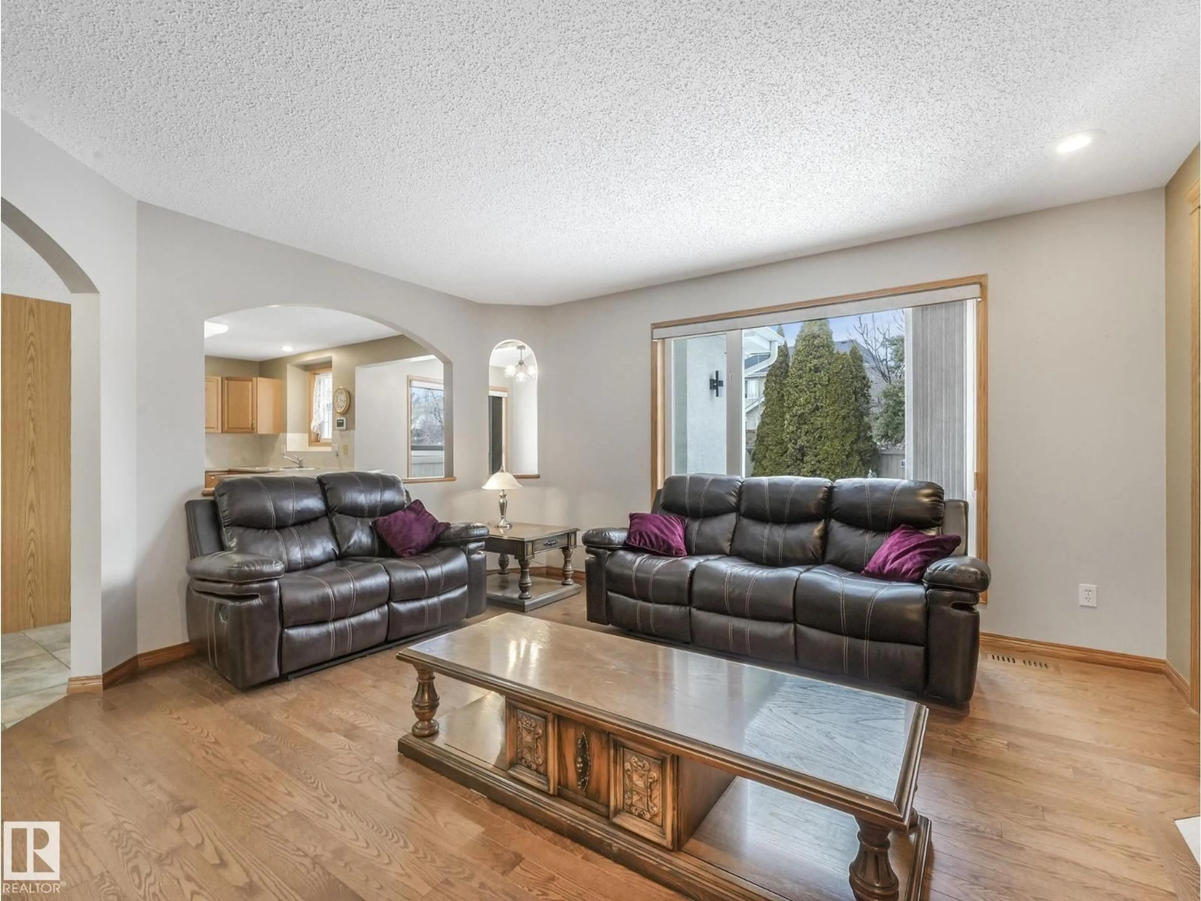 Living room with furniture, unknown for 11704 11 AV, Edmonton Alberta T6J7C3