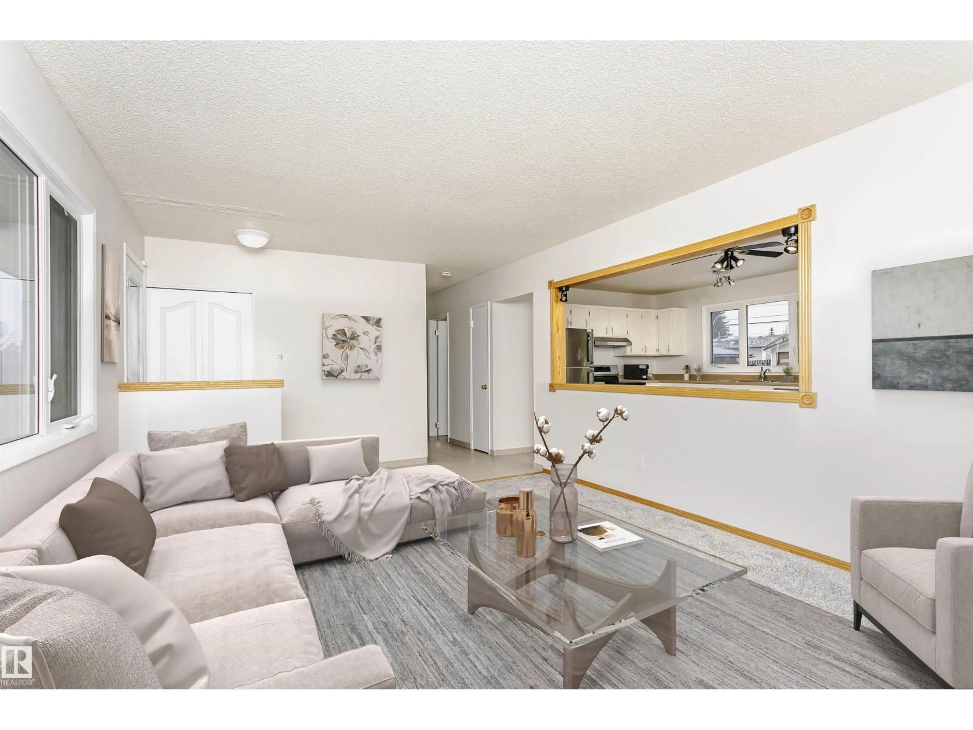 Living room with furniture, wood/laminate floor for NW - 6112 142 AV, Edmonton Alberta T5A1J5