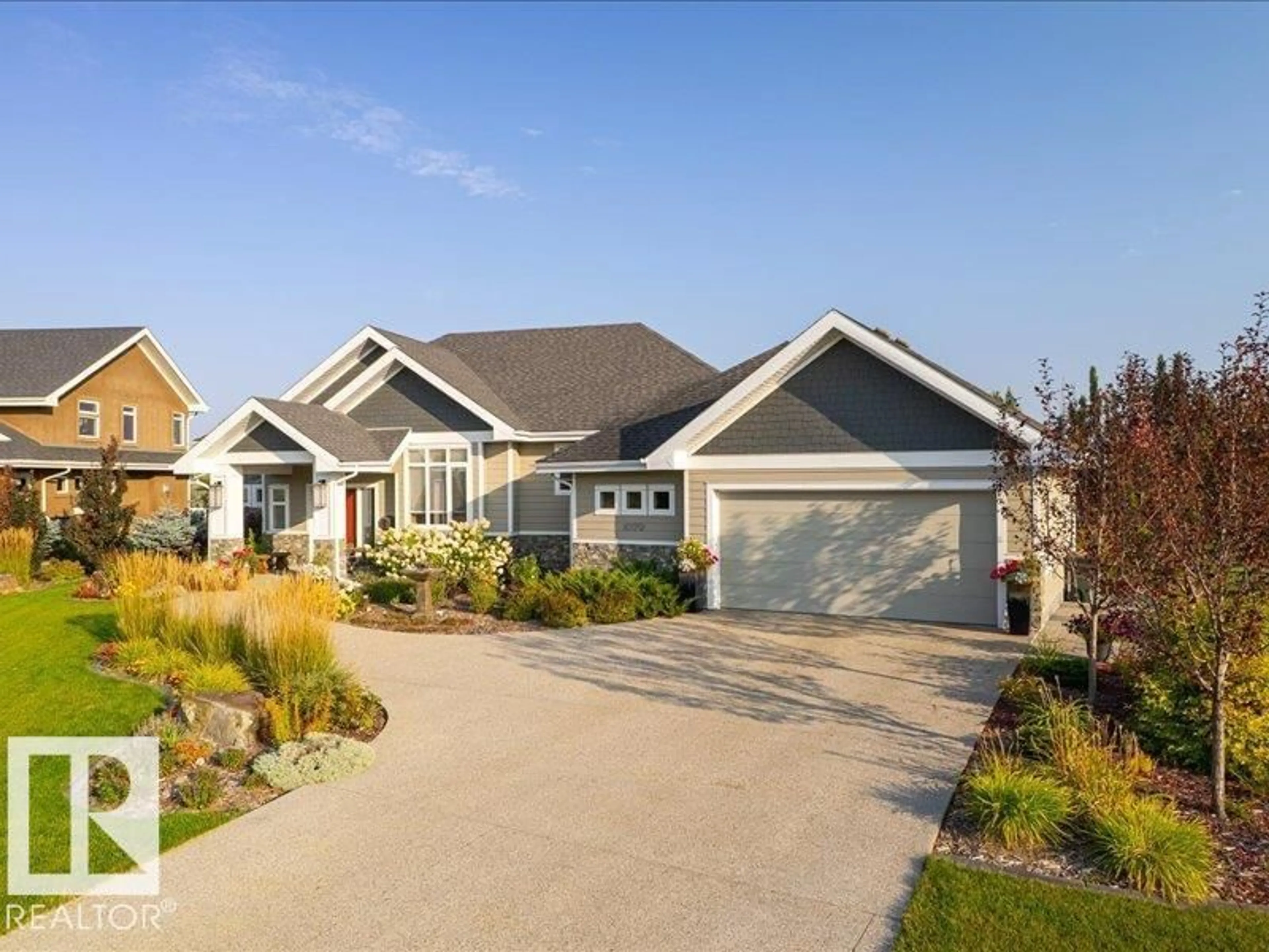 Home with vinyl exterior material, street for 1079 GENESIS LAKE BV, Stony Plain Alberta T7Z0G3