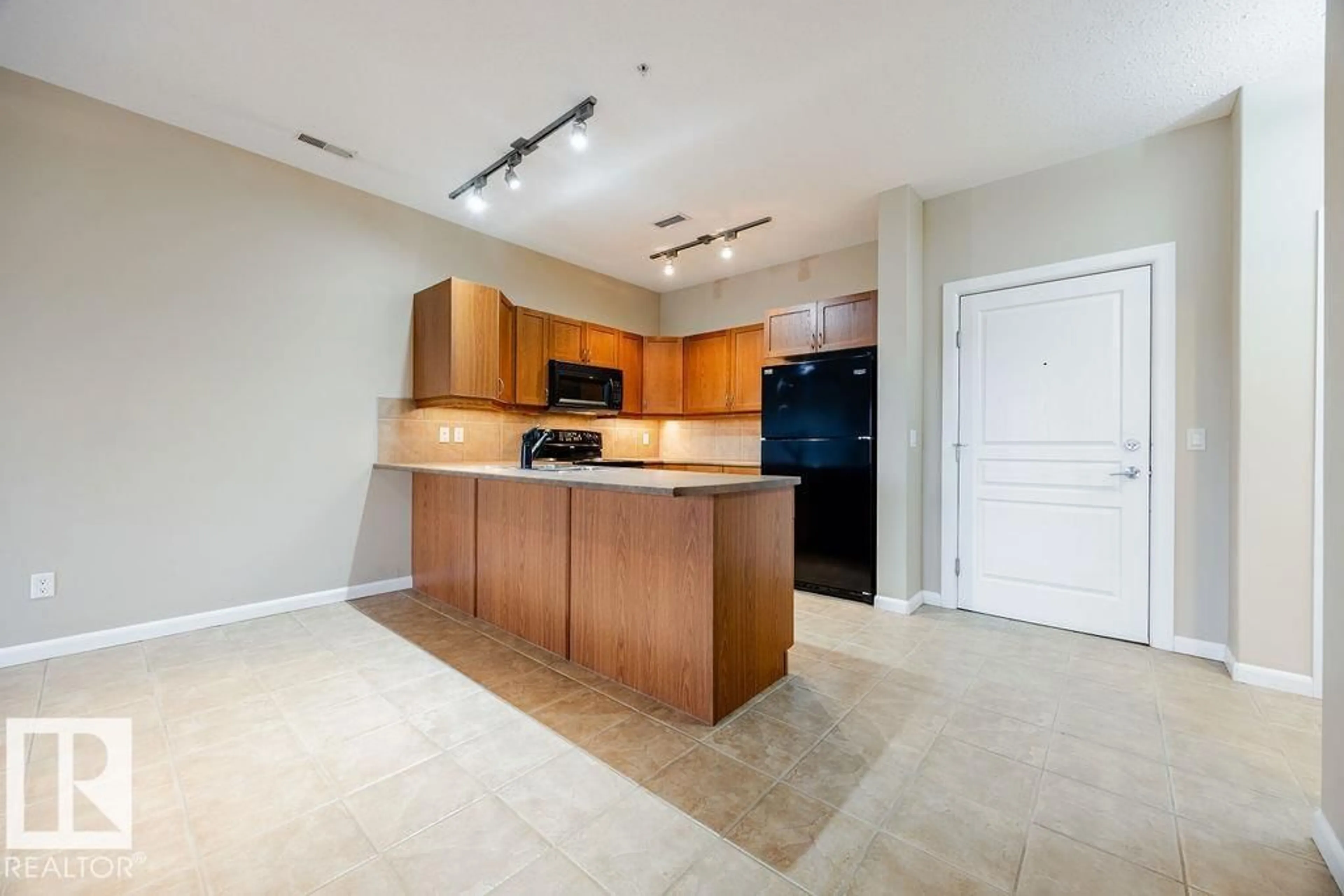 Open concept kitchen, unknown for #217 - 160 MAGRATH RD, Edmonton Alberta T6R3T7
