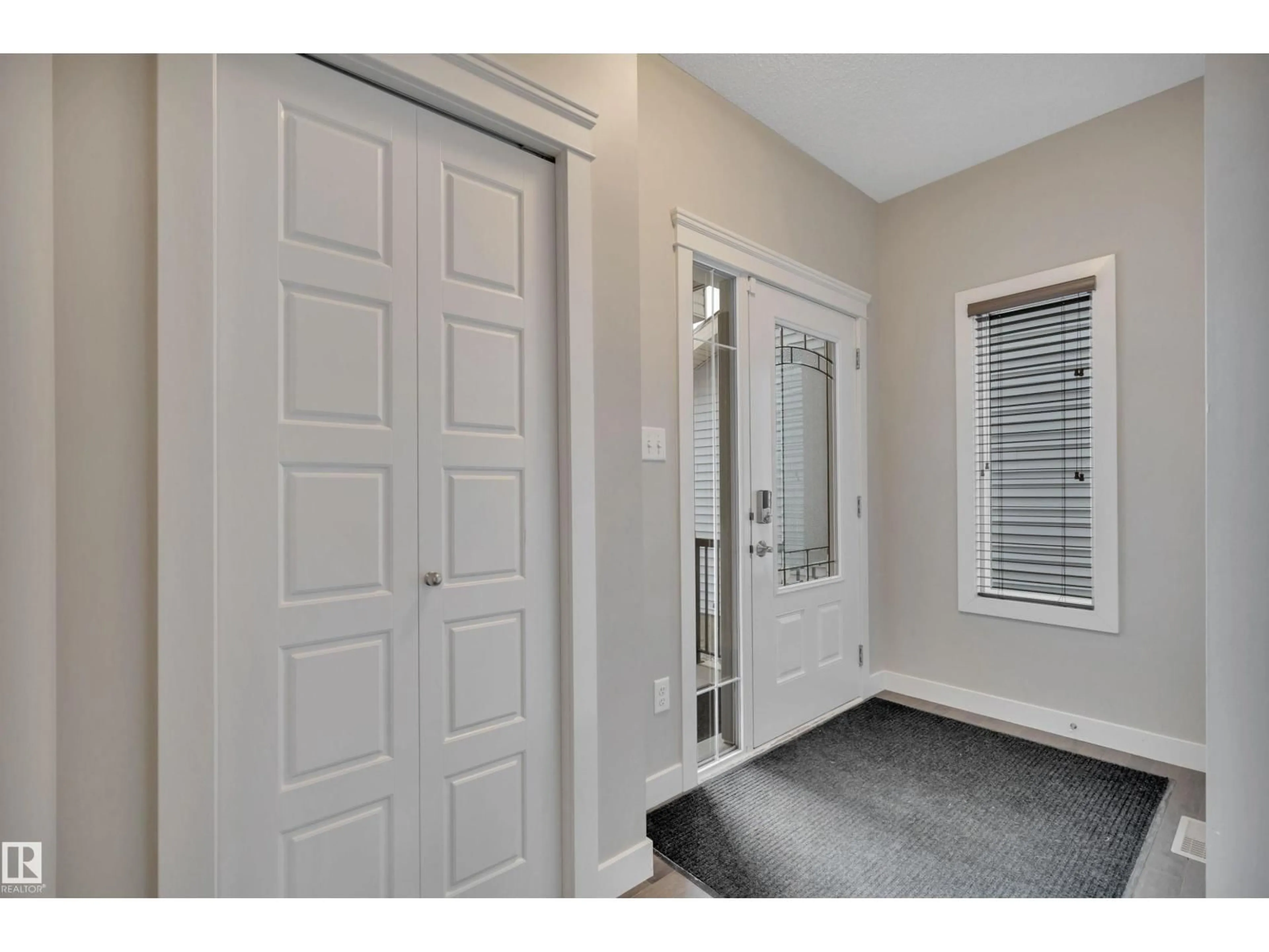 Indoor entryway for 15807 18 AV, Edmonton Alberta T6W3E7