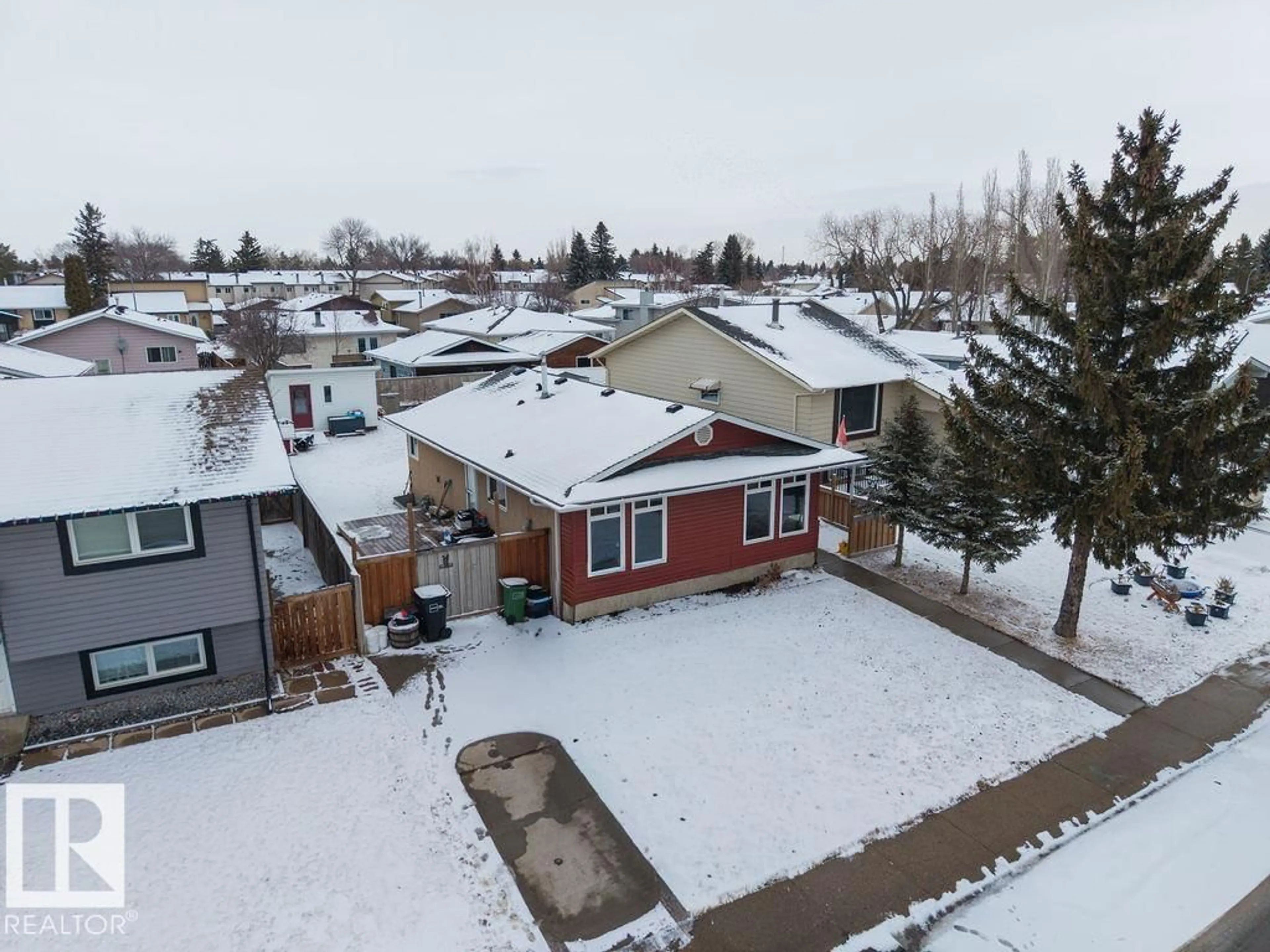 A pic from outside/outdoor area/front of a property/back of a property/a pic from drone, street for 2340 138 AV, Edmonton Alberta T5Y1C2