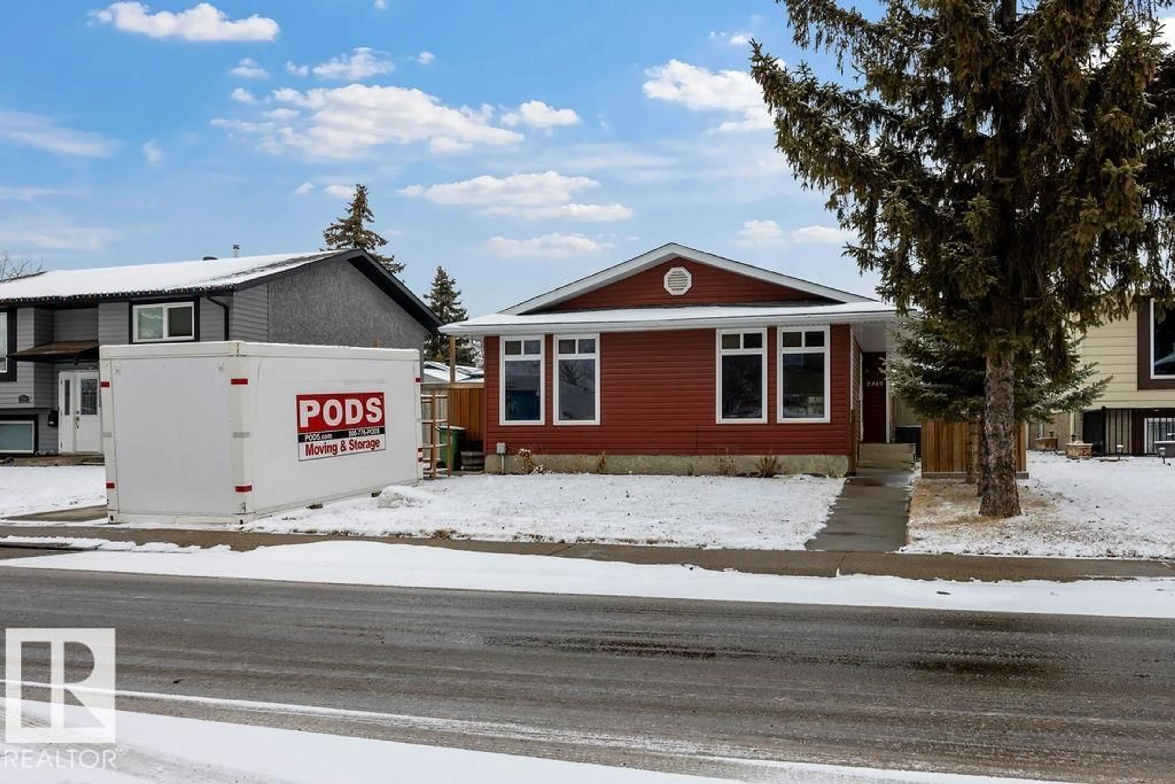 Home with vinyl exterior material, street for 2340 138 AV, Edmonton Alberta T5Y1C2