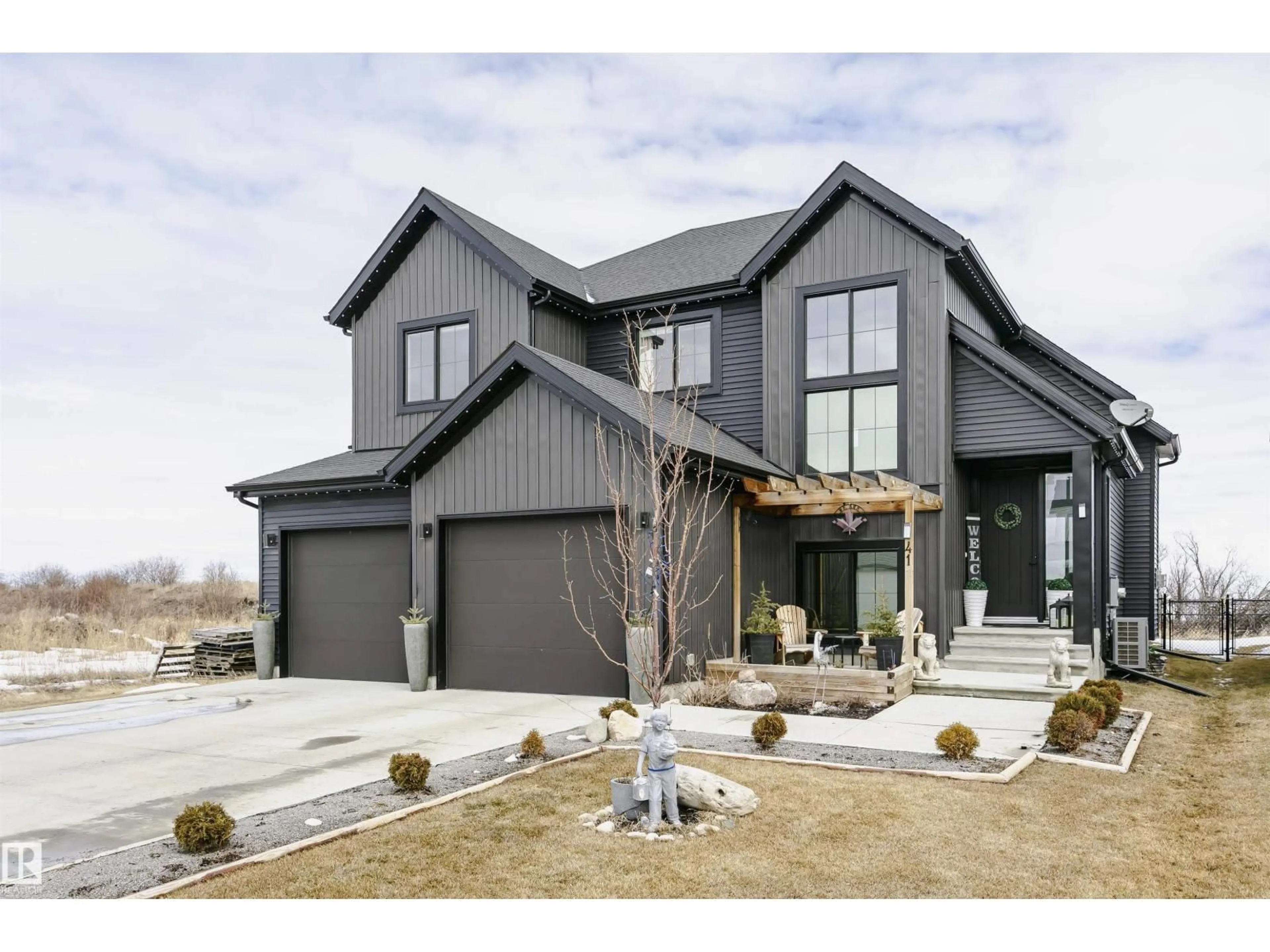 Home with brick exterior material, street for 41 - 3410 STE. ANNE TR, Rural Lac Ste. Anne County Alberta T0E0A1