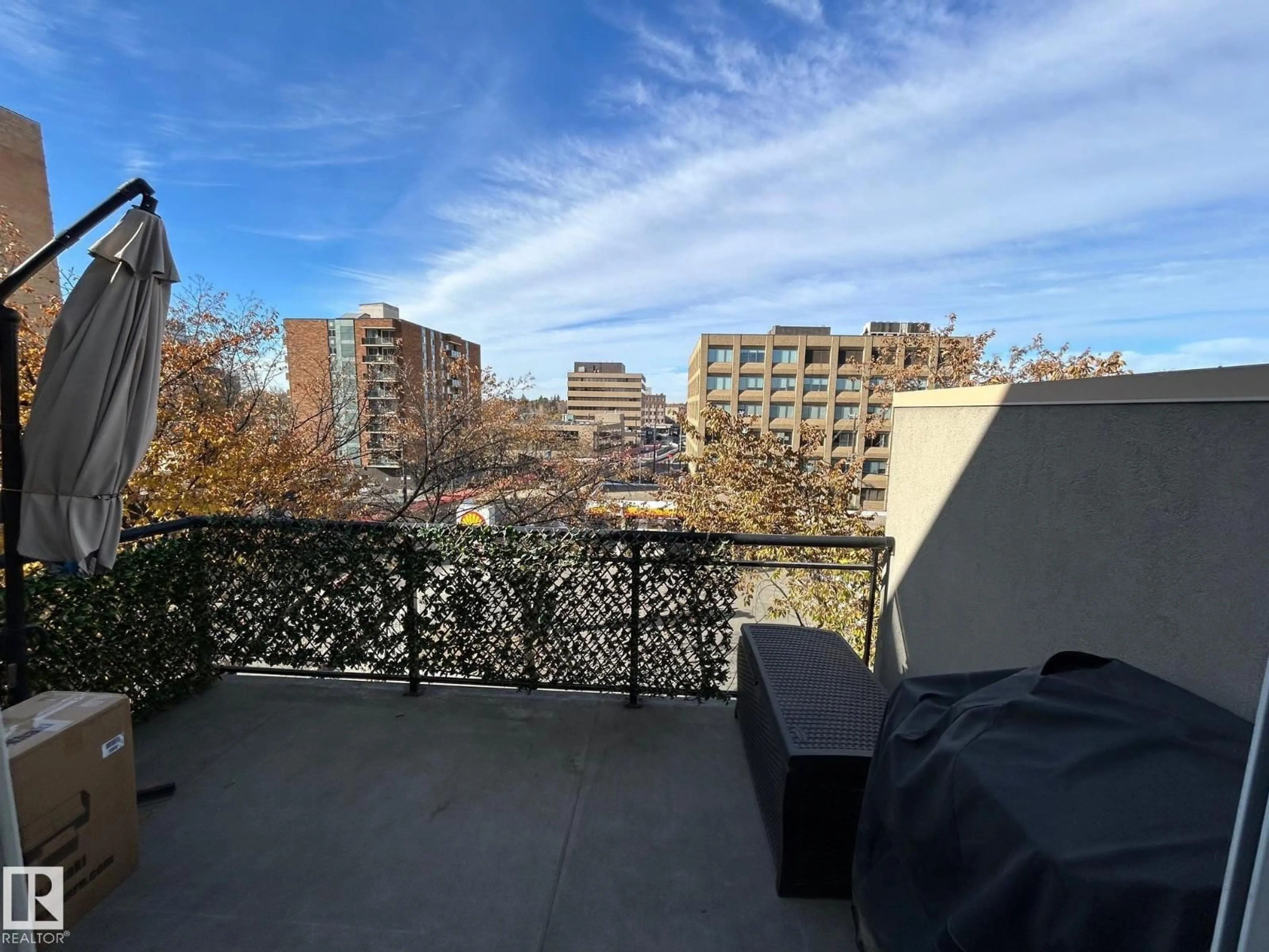 Balcony in the apartment, city buildings view from balcony for #443 - 10403 122 ST, Edmonton Alberta T5N4C1