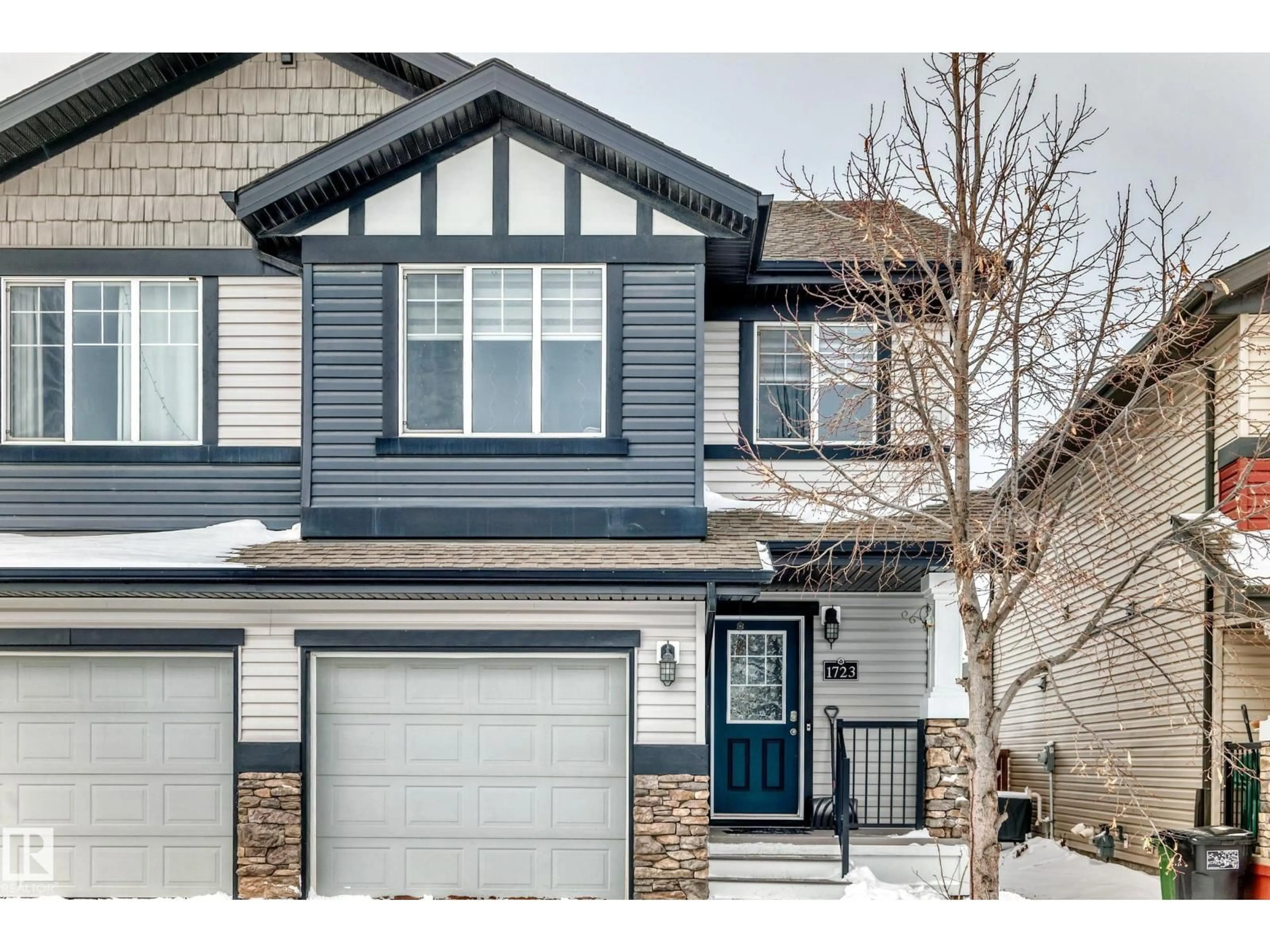 Home with vinyl exterior material, street for NW - 1723 HAMMOND CR, Edmonton Alberta T6M0N1