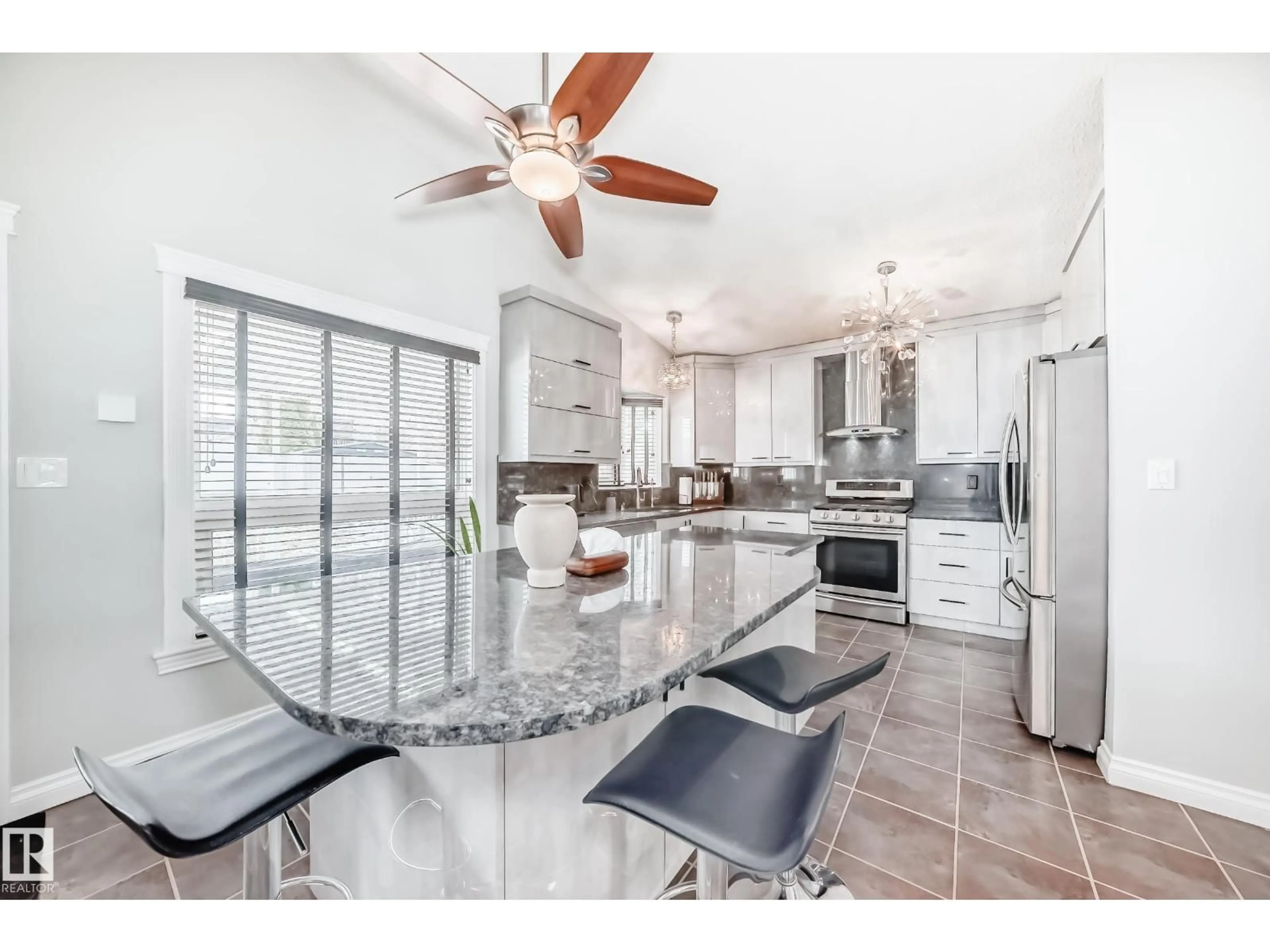 Open concept kitchen, ceramic/tile floor for 3107 43 AV, Edmonton Alberta T6T1C7