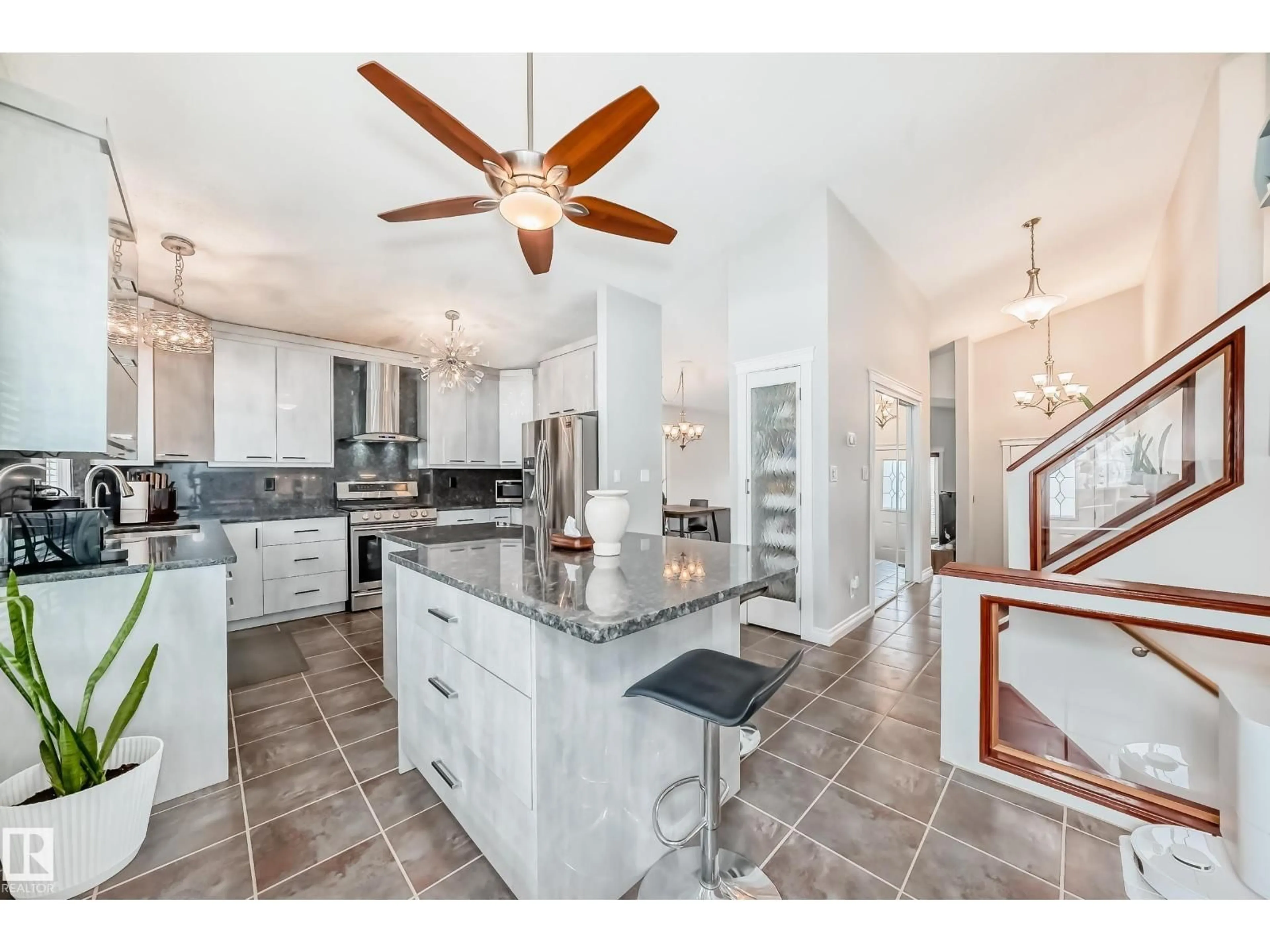 Open concept kitchen, ceramic/tile floor for 3107 43 AV, Edmonton Alberta T6T1C7