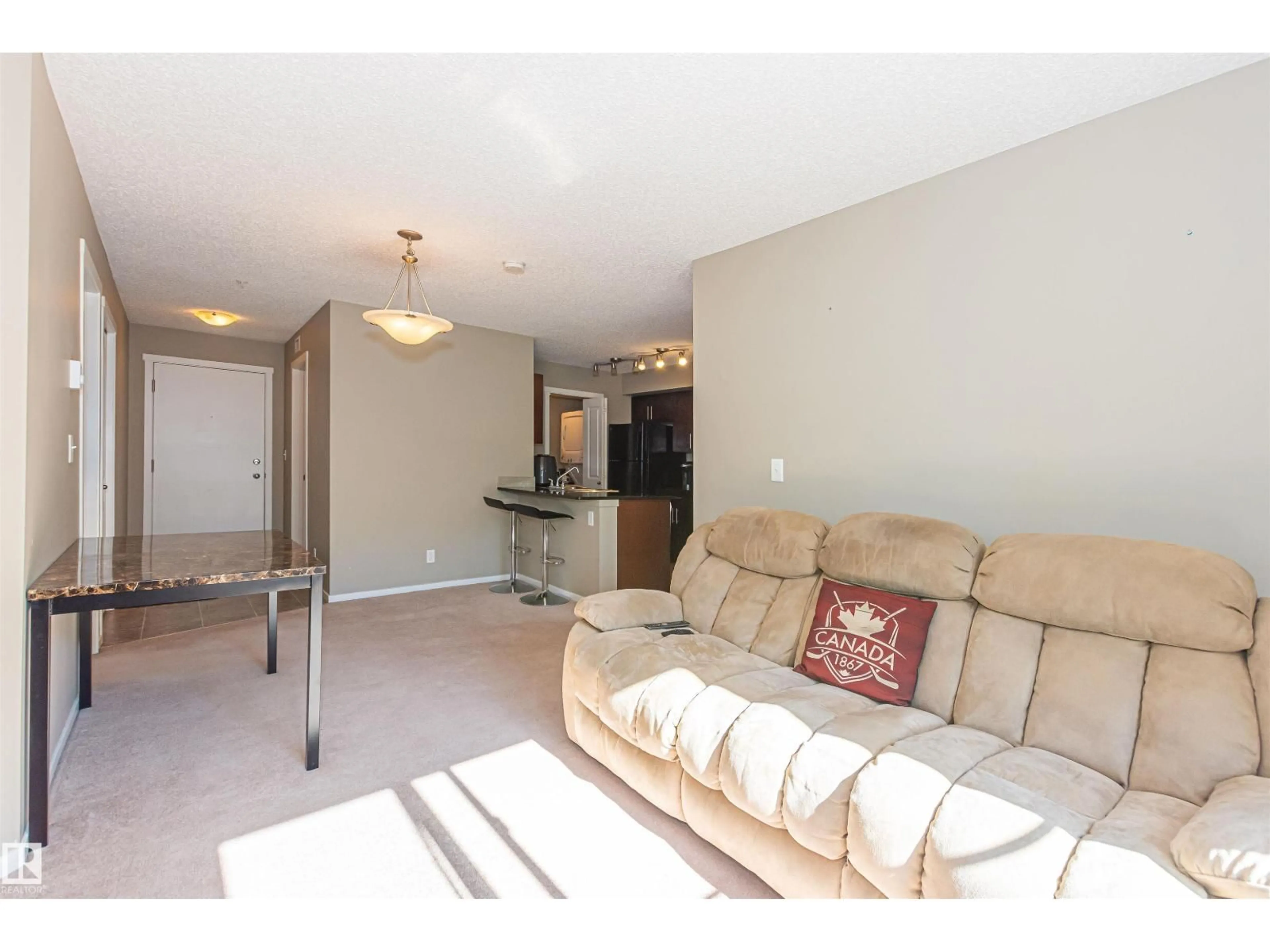 Living room with furniture, unknown for #215 - 5816 MULLEN PL, Edmonton Alberta T6R0W3