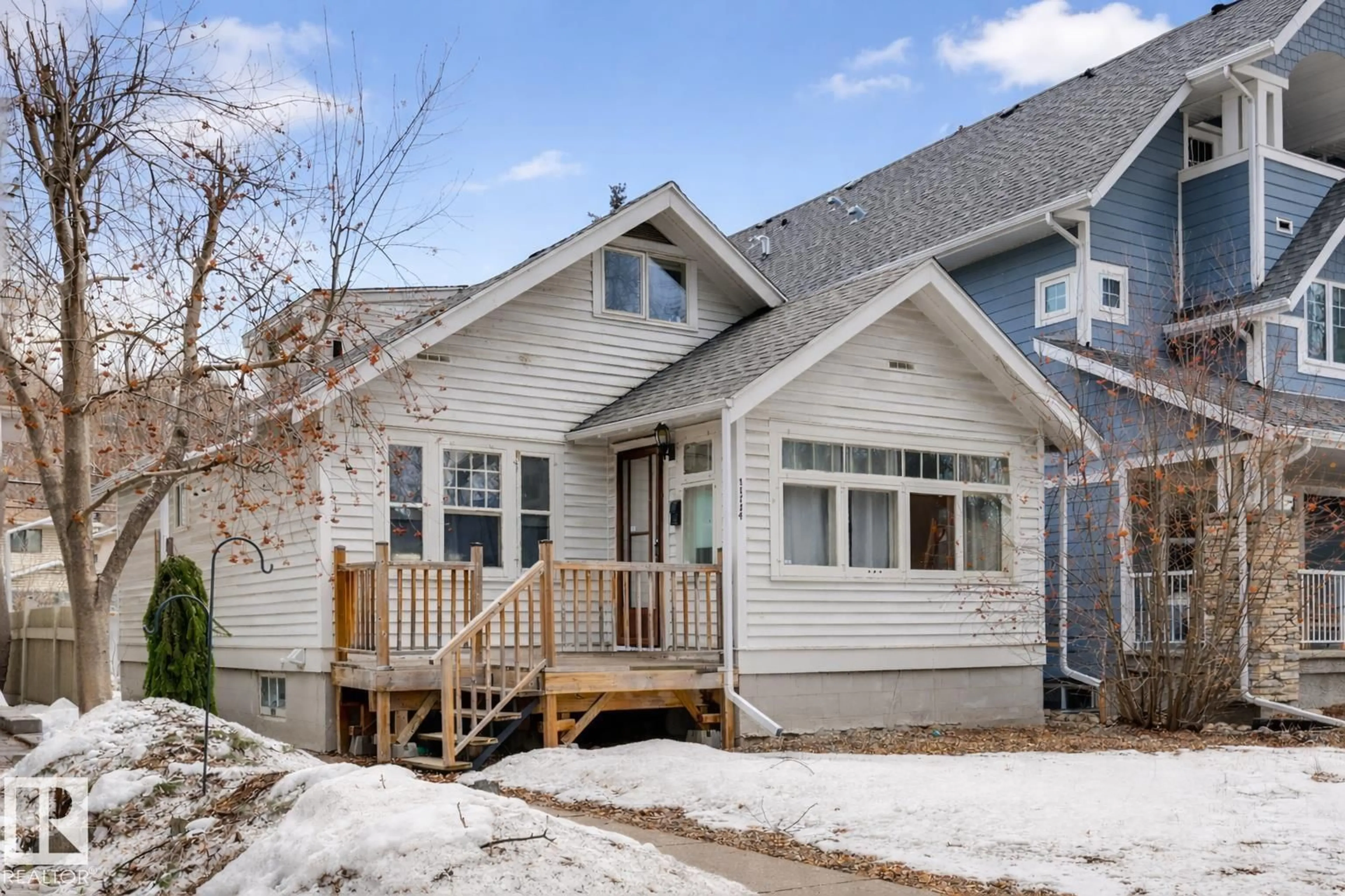 Home with vinyl exterior material, street for 11114 80 AV, Edmonton Alberta T6G0R4