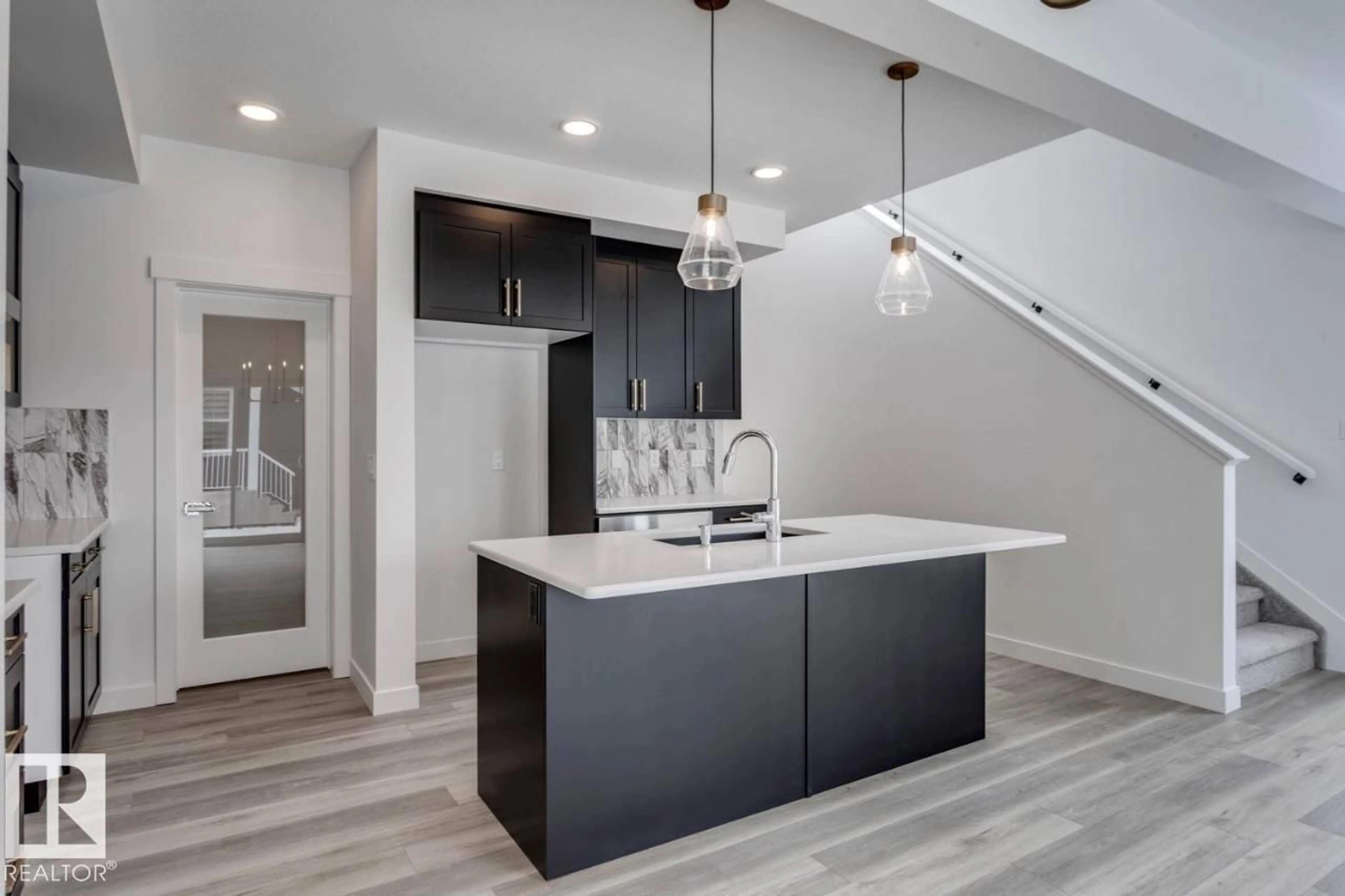 Open concept kitchen, unknown for NW - 1835 188 ST, Edmonton Alberta T6T2M9