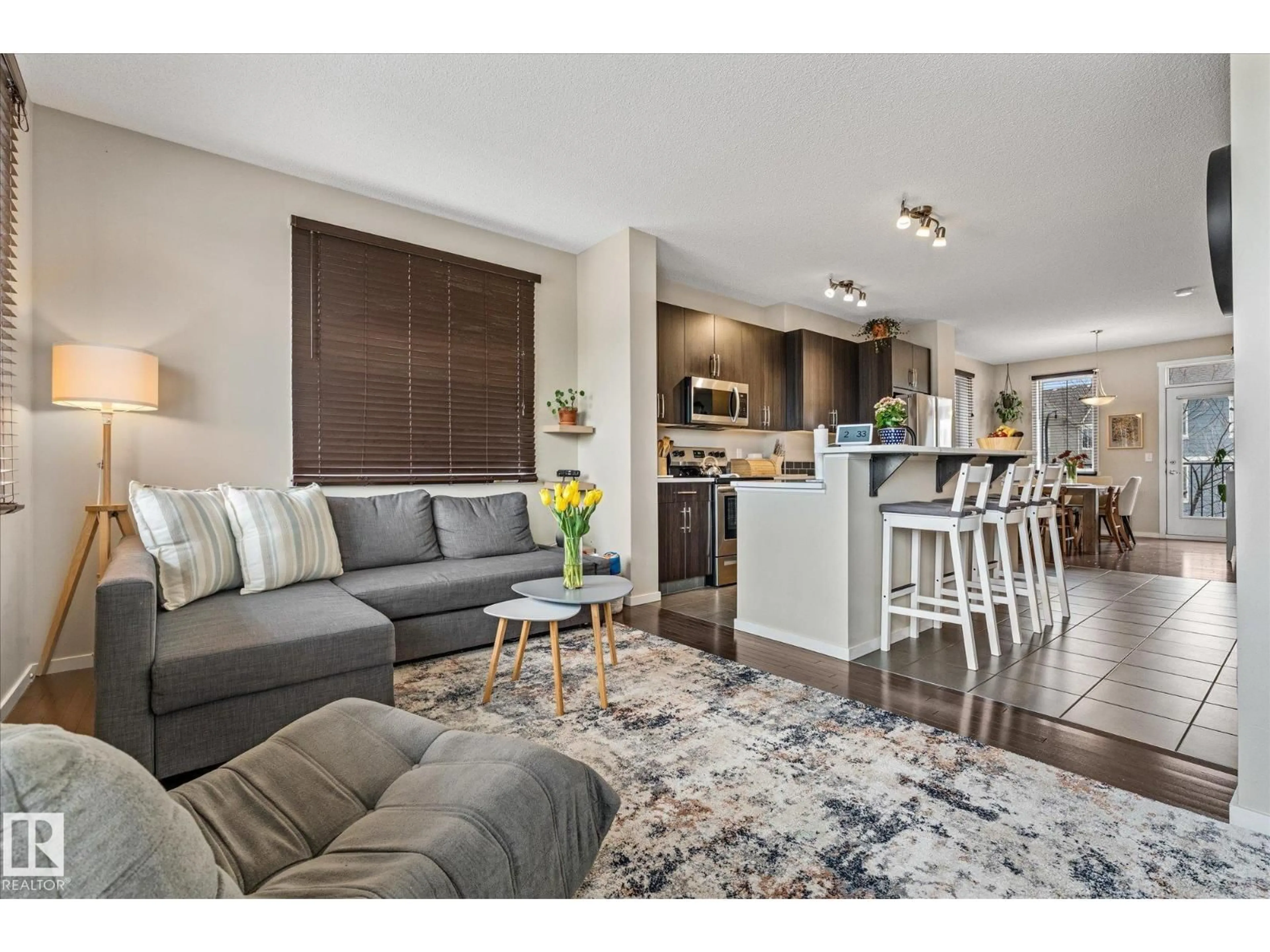 Open concept kitchen, wood/laminate floor for 603 - 165 WATT BV, Edmonton Alberta T6X0P3