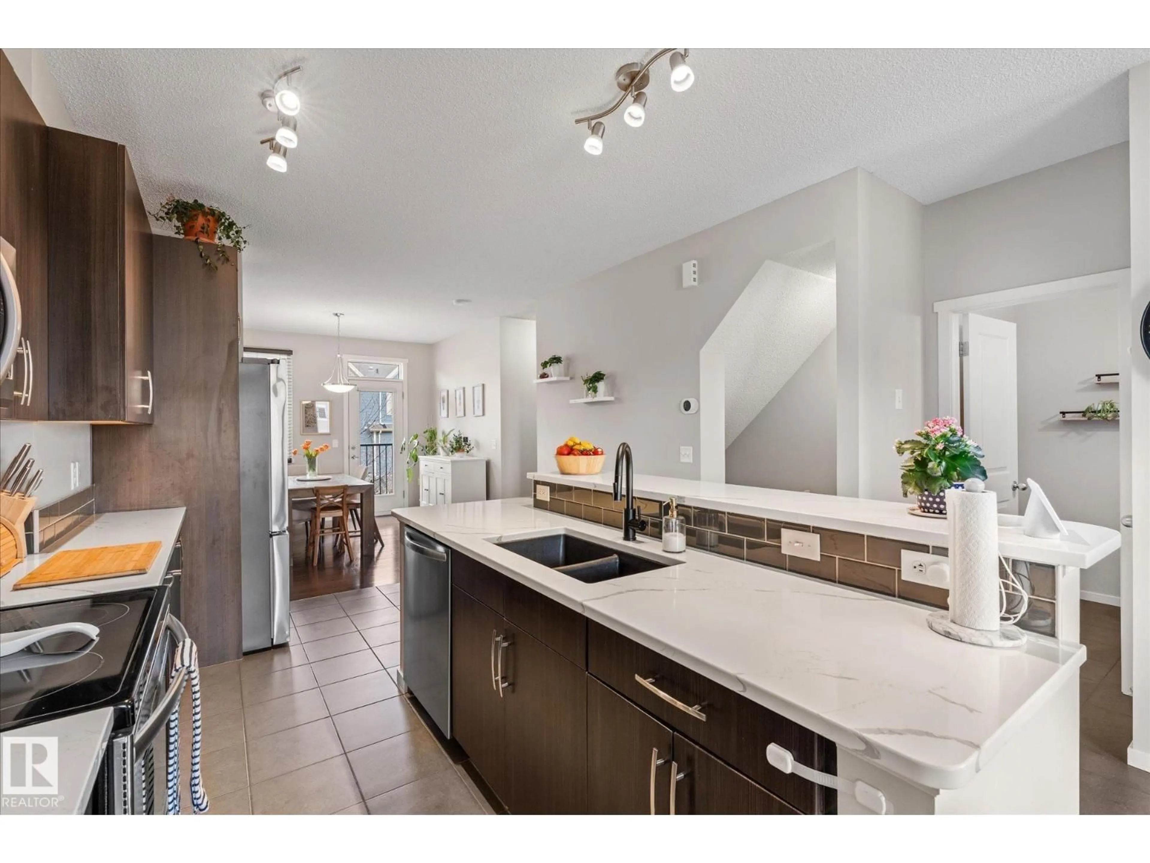 Open concept kitchen, ceramic/tile floor for 603 - 165 WATT BV, Edmonton Alberta T6X0P3